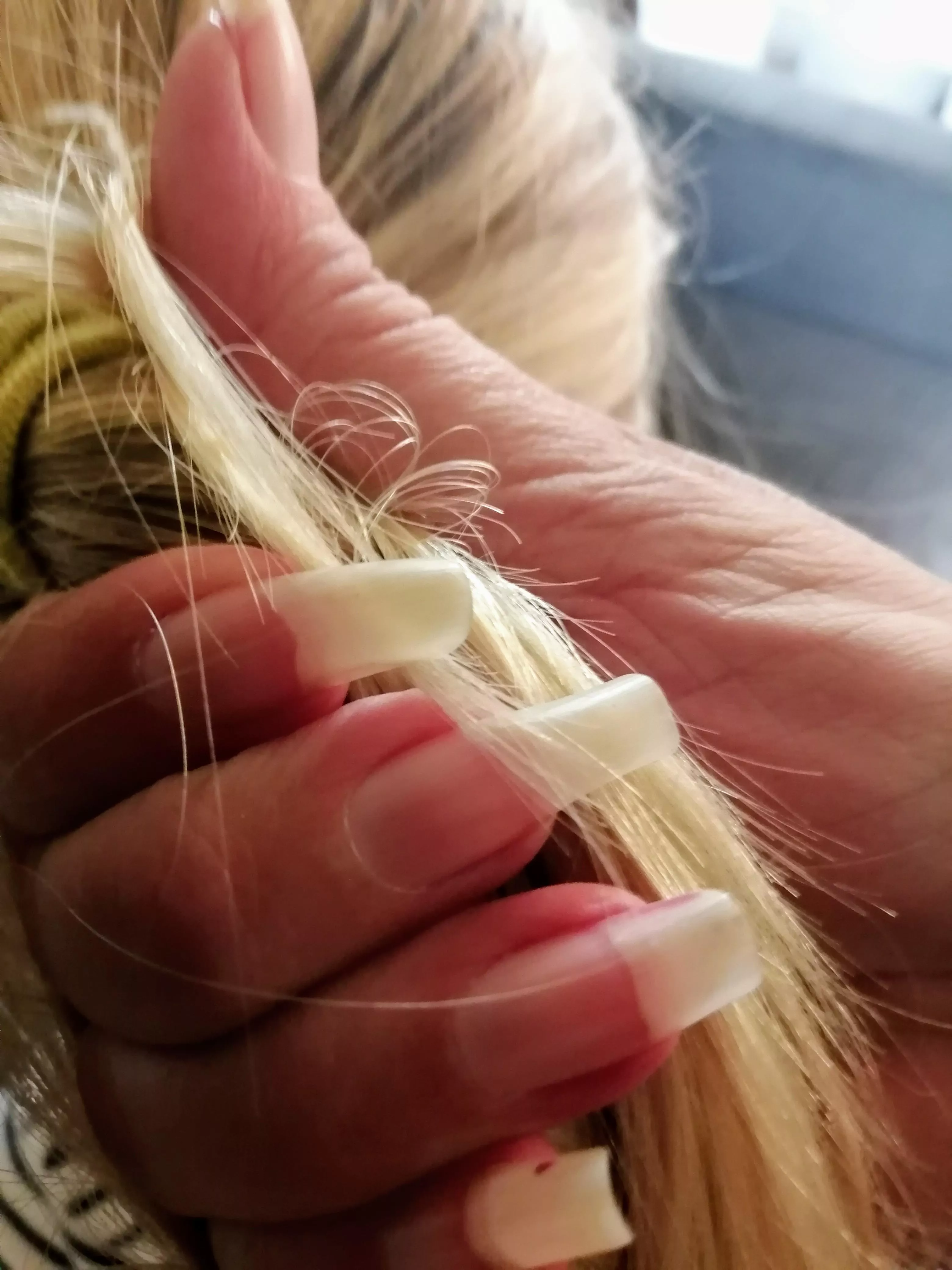 A little tug on a ponytail... With my natural nails!