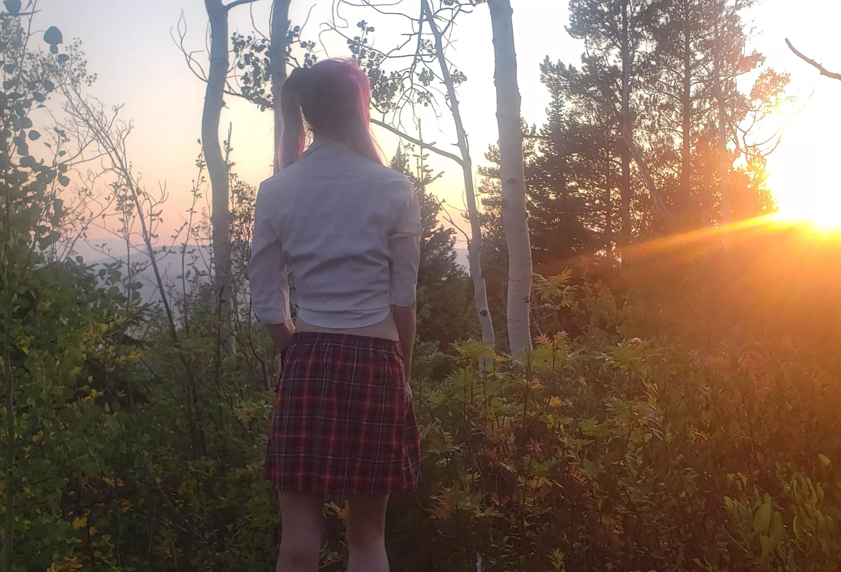 A wild schoolgirl with pigtails.