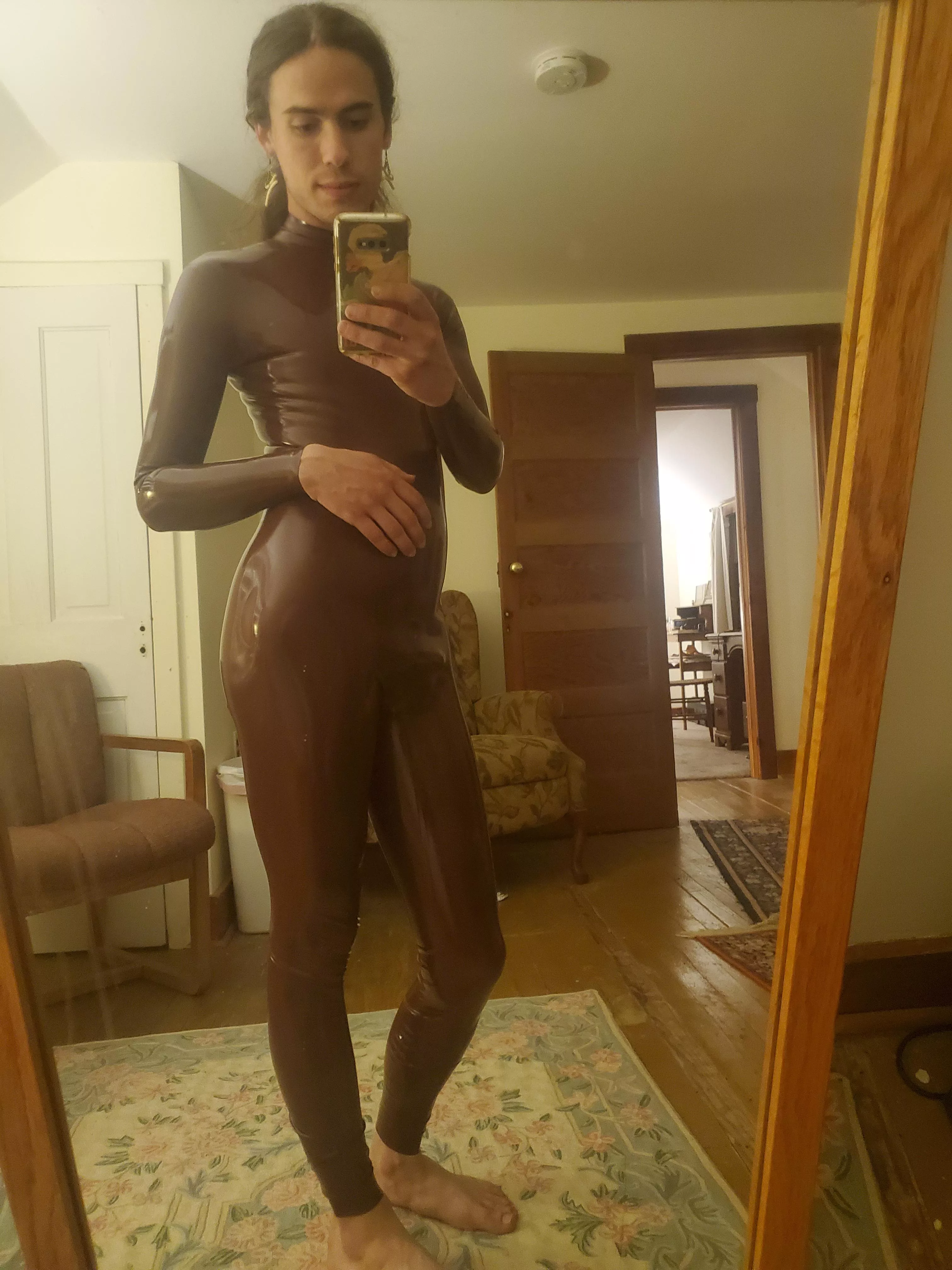 Absolutely jazzed about my brand new neck entry zipperless catsuit from Black and Shiny Latex