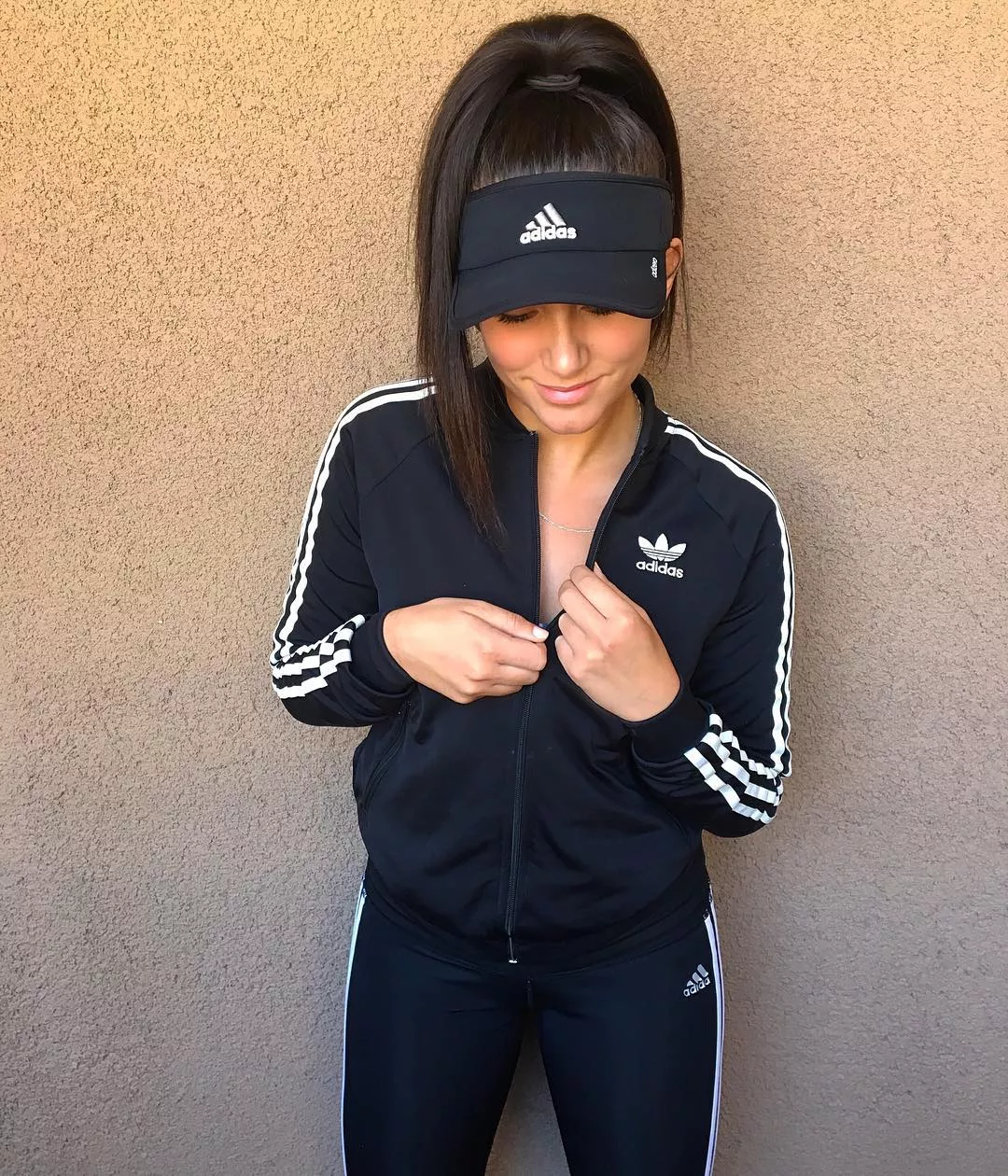 Adidas Track Suit, Visor and Ponytail