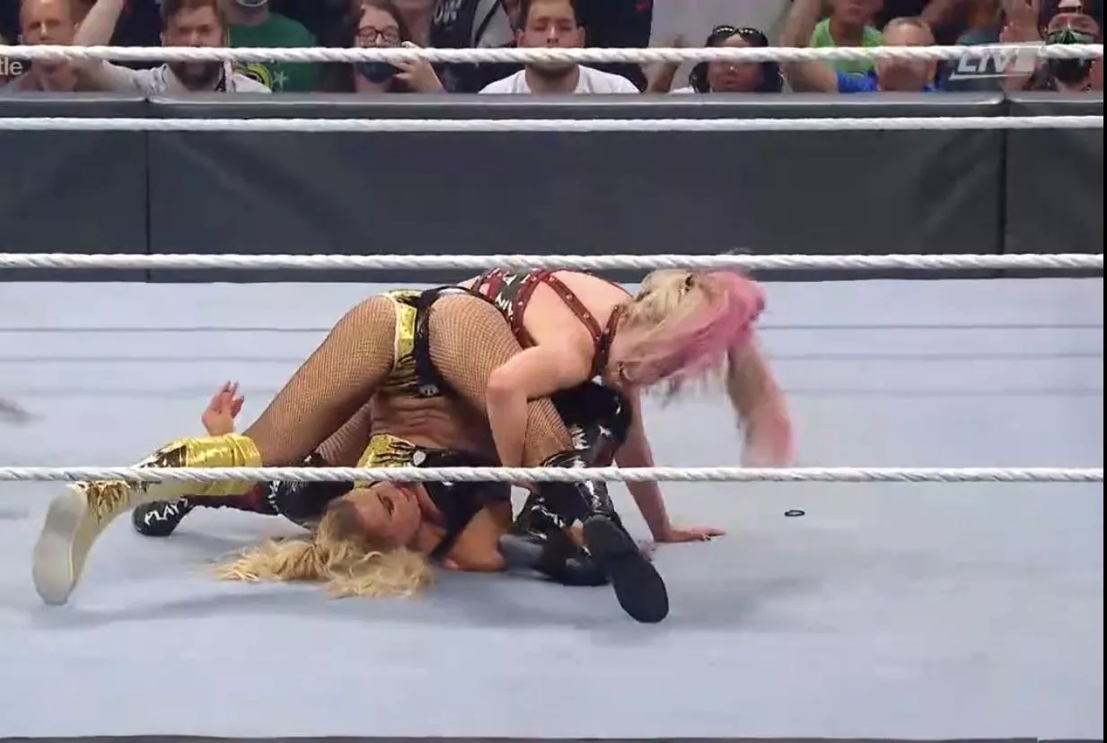 Alexa Bliss opening Charlotteâ€™s legs wide open