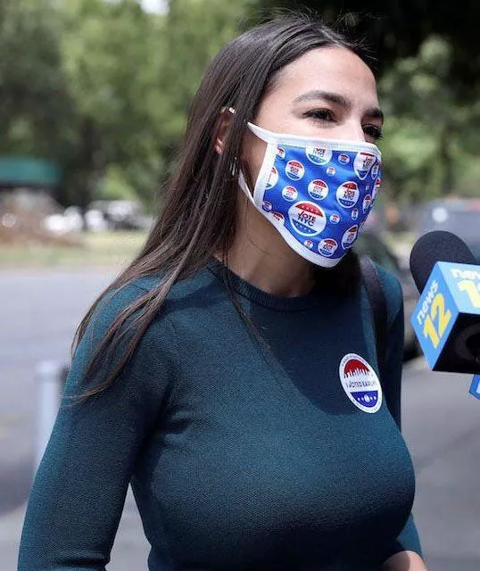 AOC tries to hide her mommy milkers but she’s lowkey STACKED