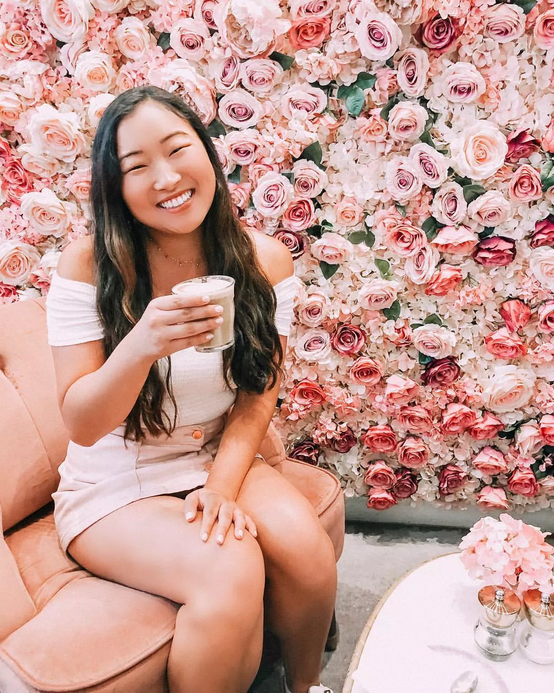 Asian Cutie Smiling By The Flowers