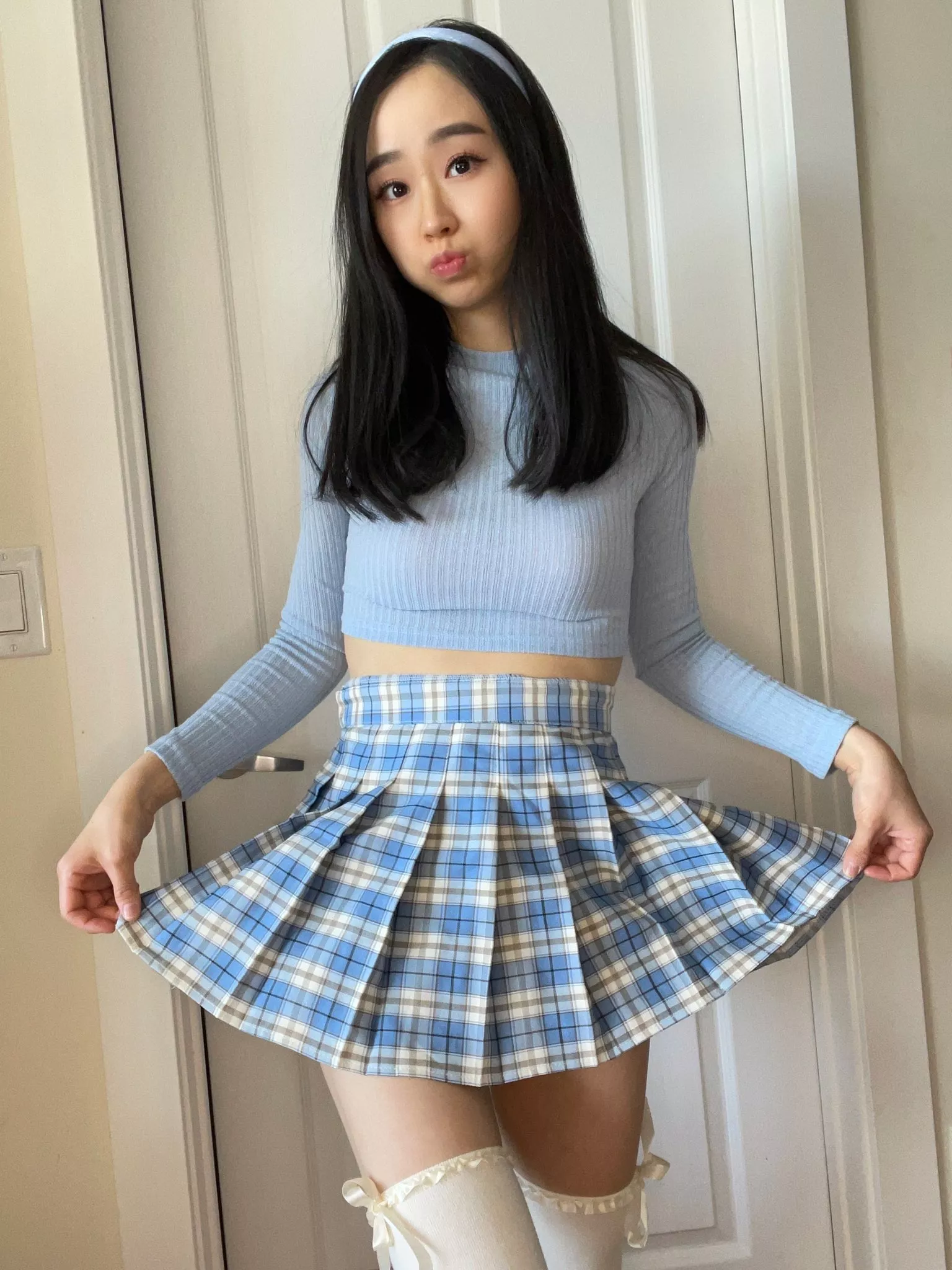 Asian in plaid skirt