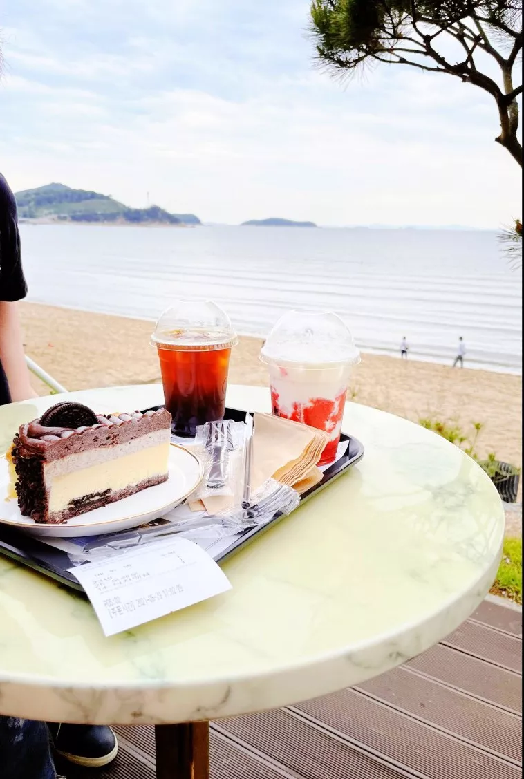 At a cafe right in front of the beach May 2021