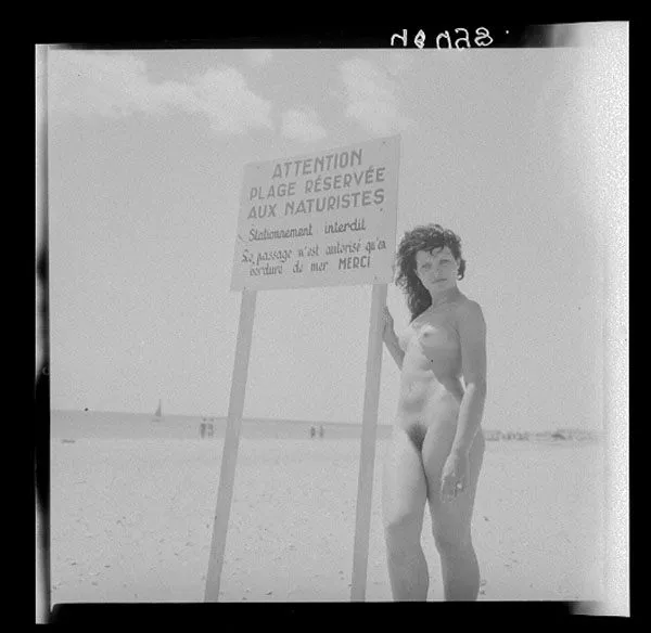 Attention: Beach reserved to naturists. No parking. Passage authorized on the shore only. Thanks. (Supposedly Cap d'Agde in the 1970s)