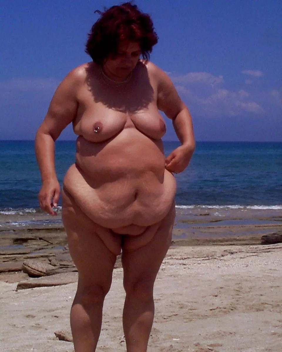 Big belly on the nude beach