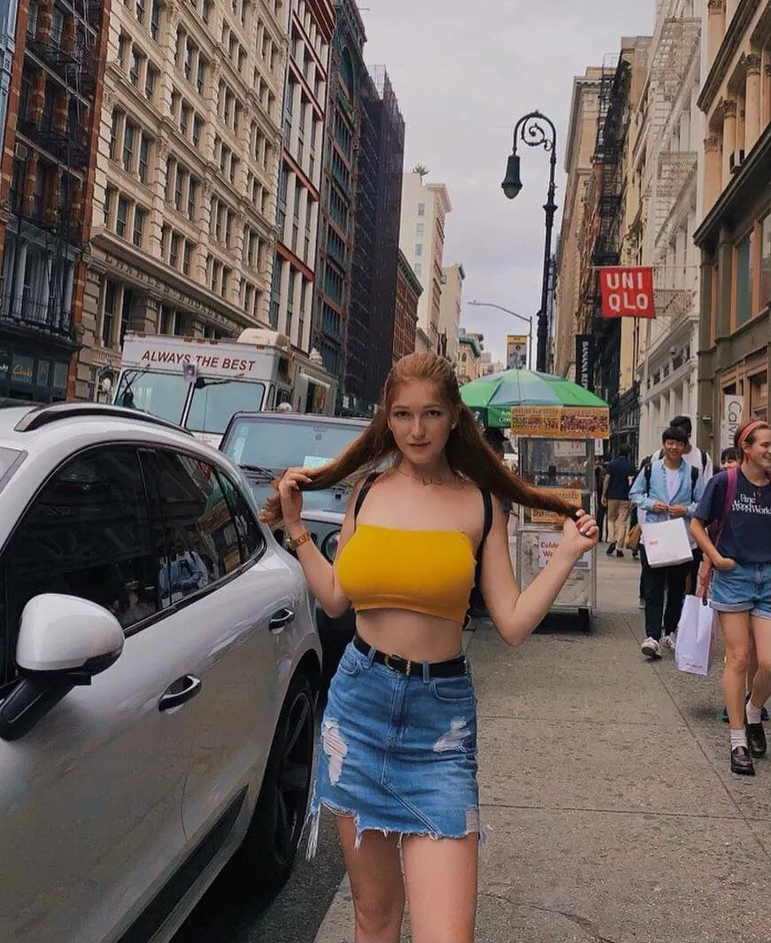 Busty redhead