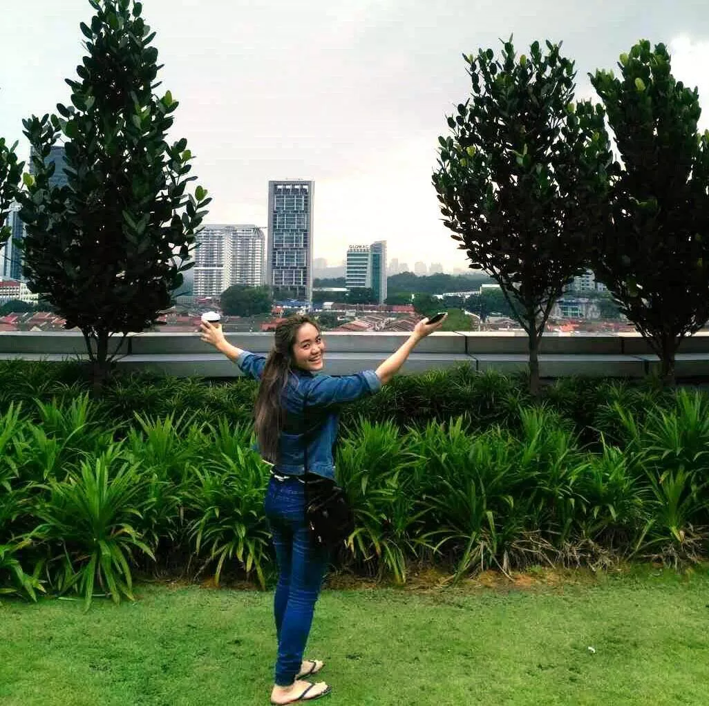 butts, grass and buildings. would you sniff that butt?