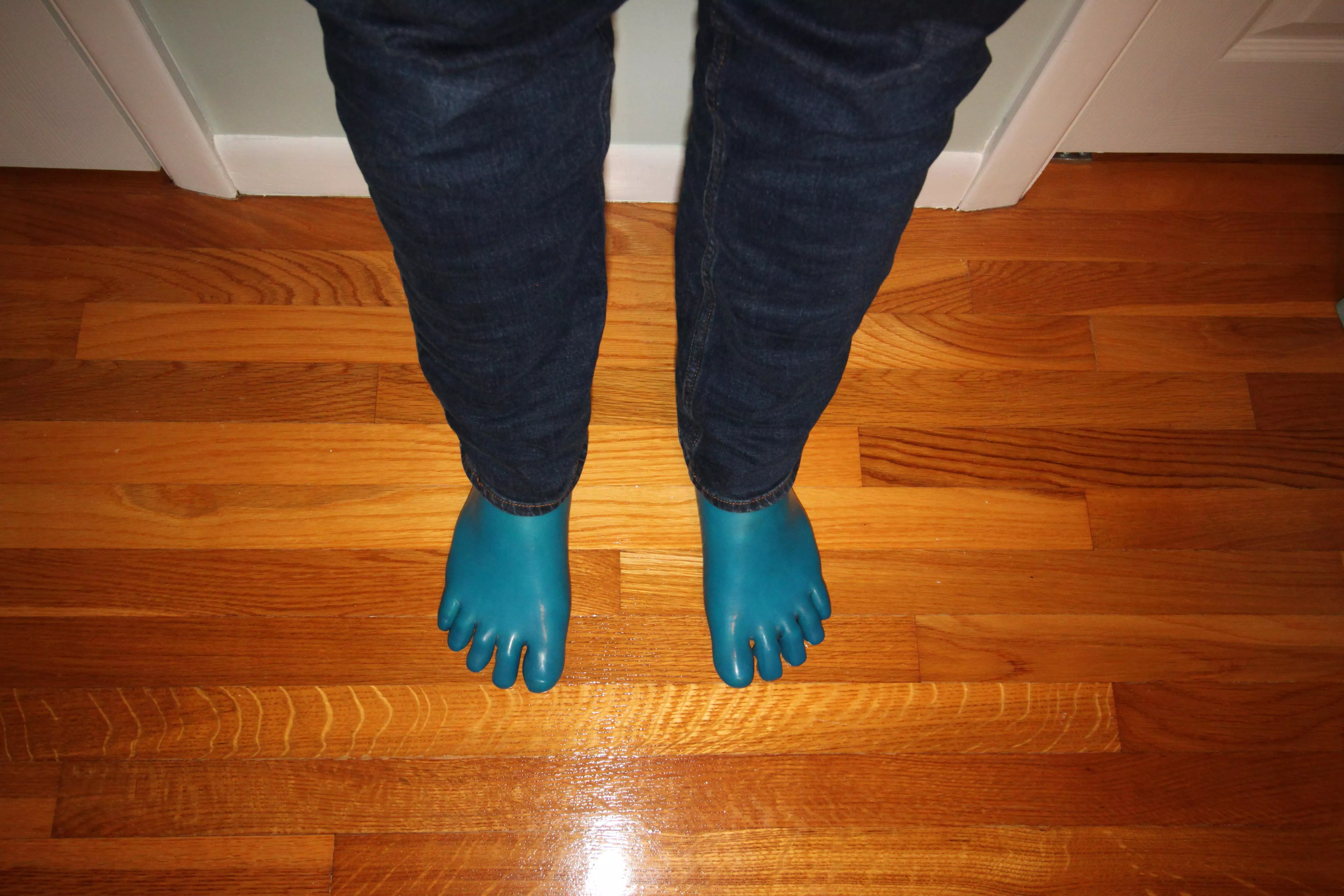 Cerulean blue latex toe socks under jeans