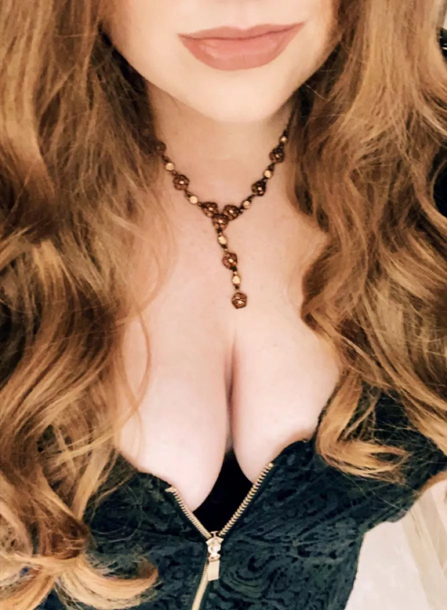 Cleavage and curls.