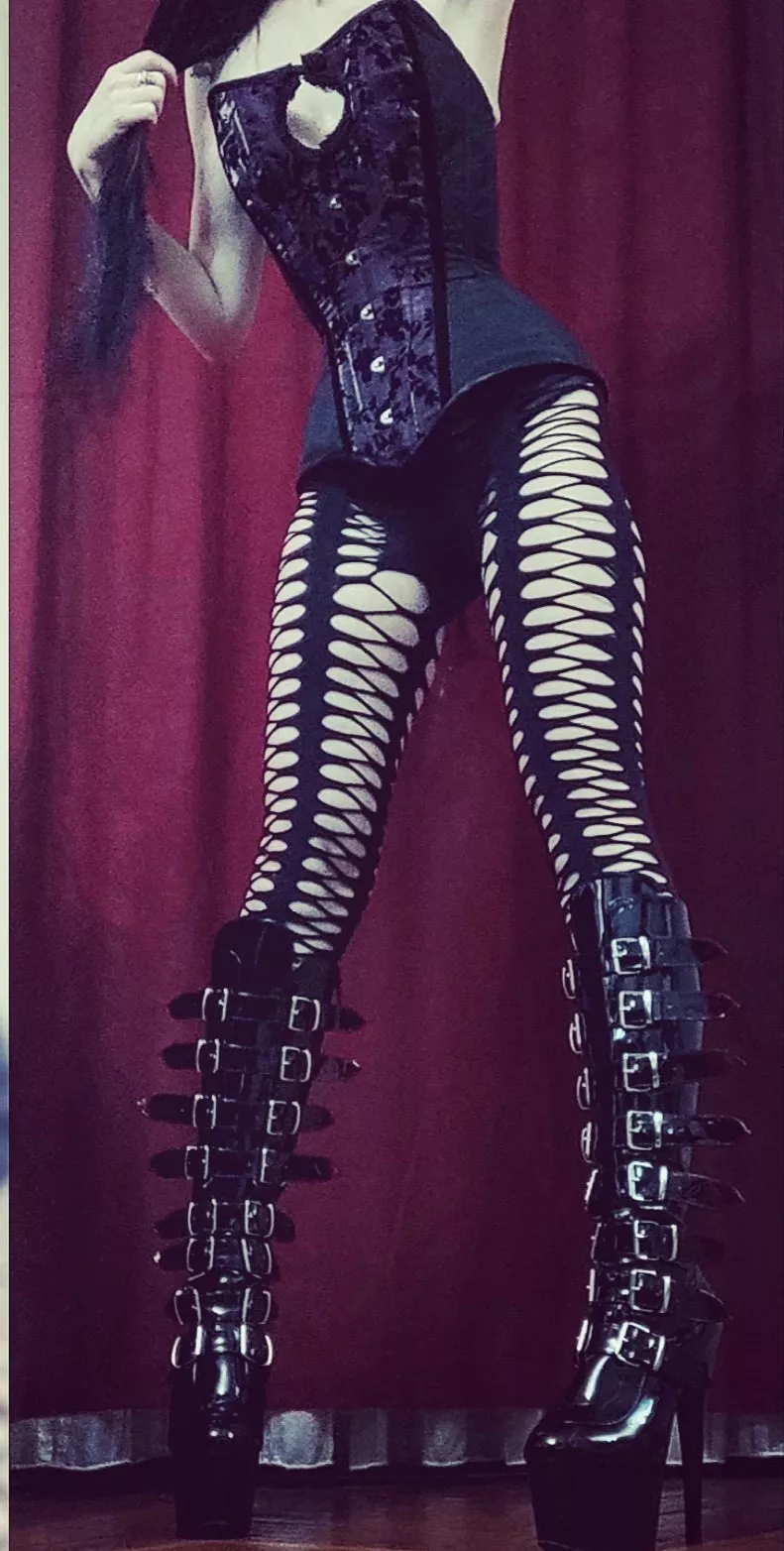 Corset, fishnets and boots, what do you notice first?