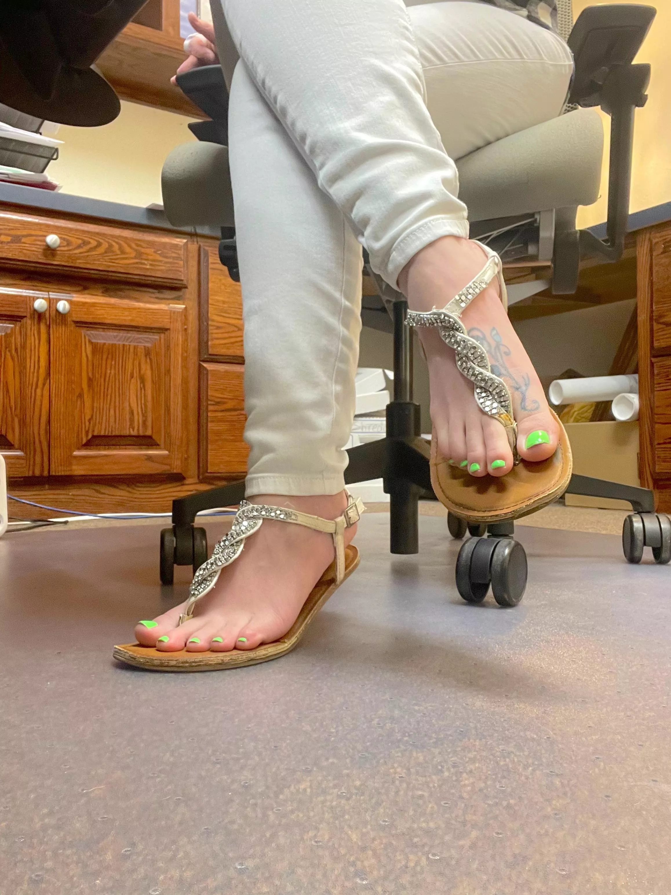 Could you step into my office and remove these sandals for me? Or should I keep them on?