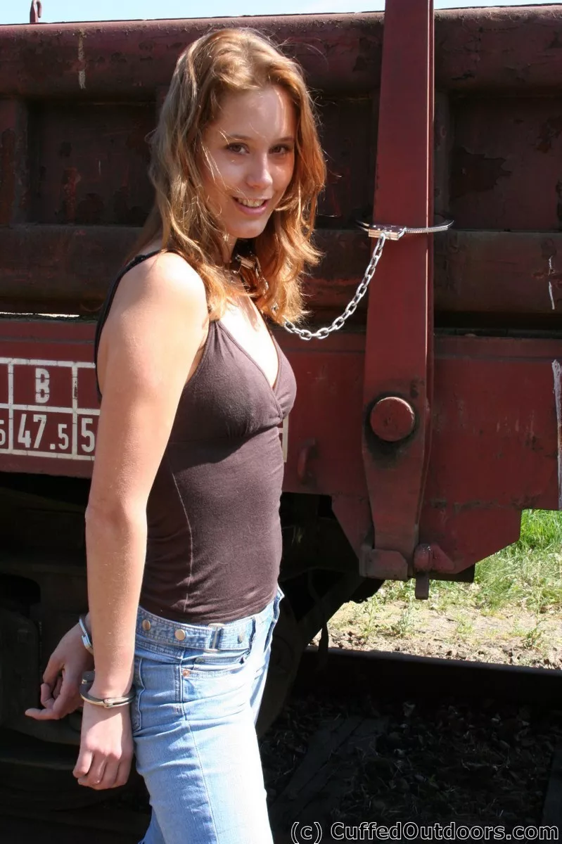 Cuffed to a Train (x-post from /r/OutdoorBondage)