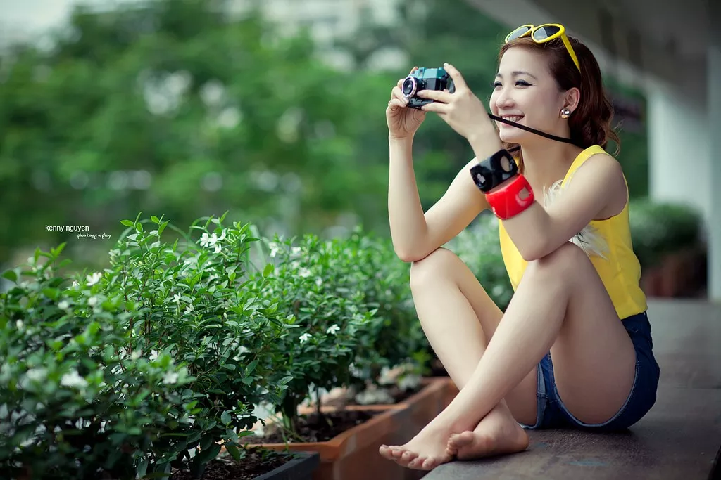 Cute Asian taking a photo