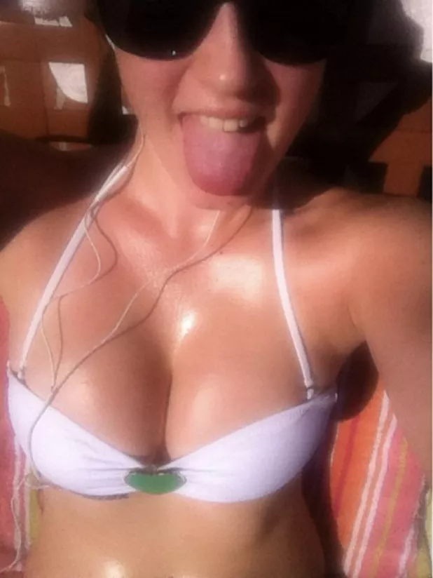 Cute bikini babe showing off her tongue