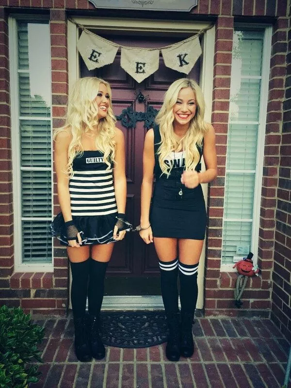 Cute blondes cuffed together