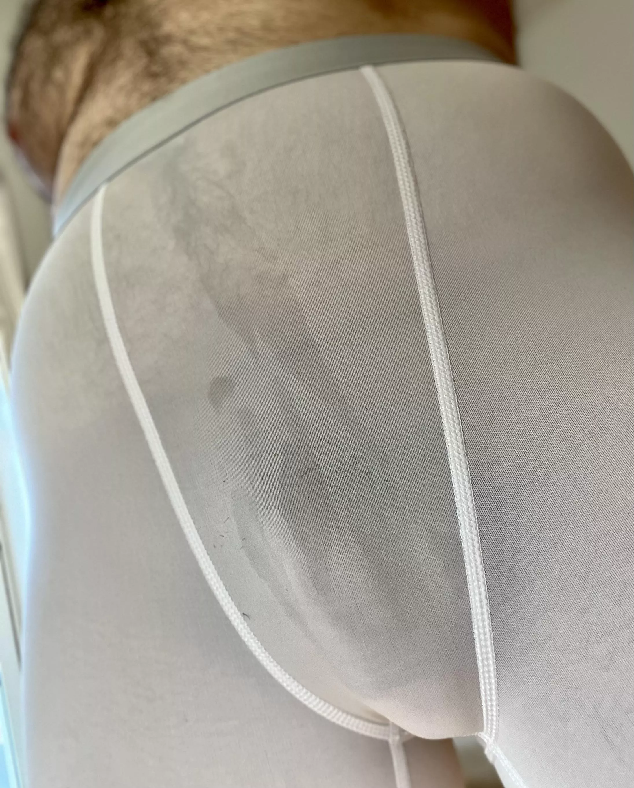 Dripping sweat on my white spandexed bulge 😜😈