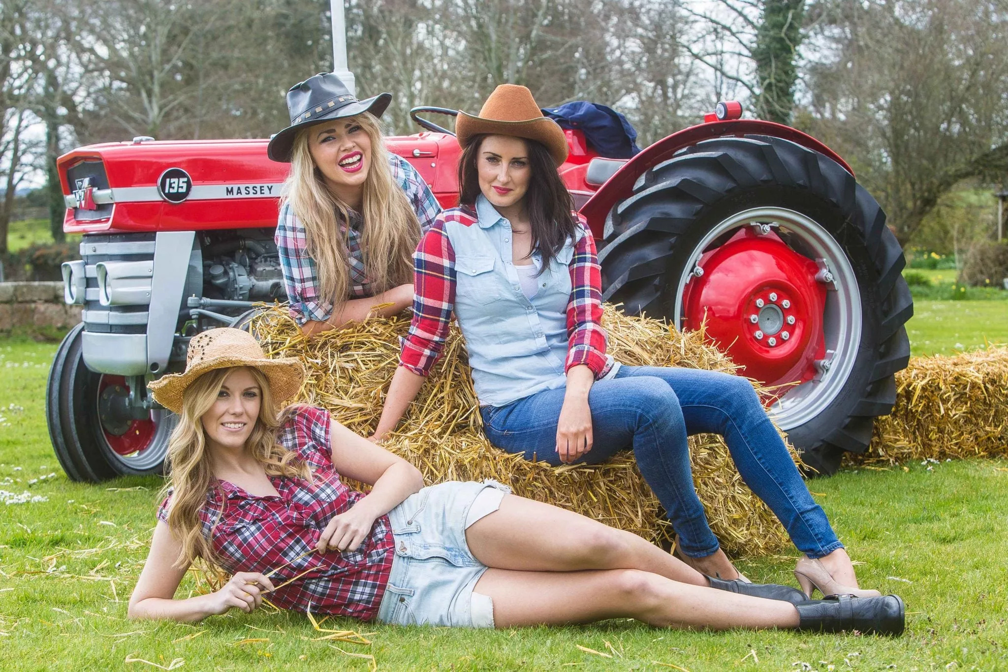 Farm girls in Ireland with a Massey Ferguson 135