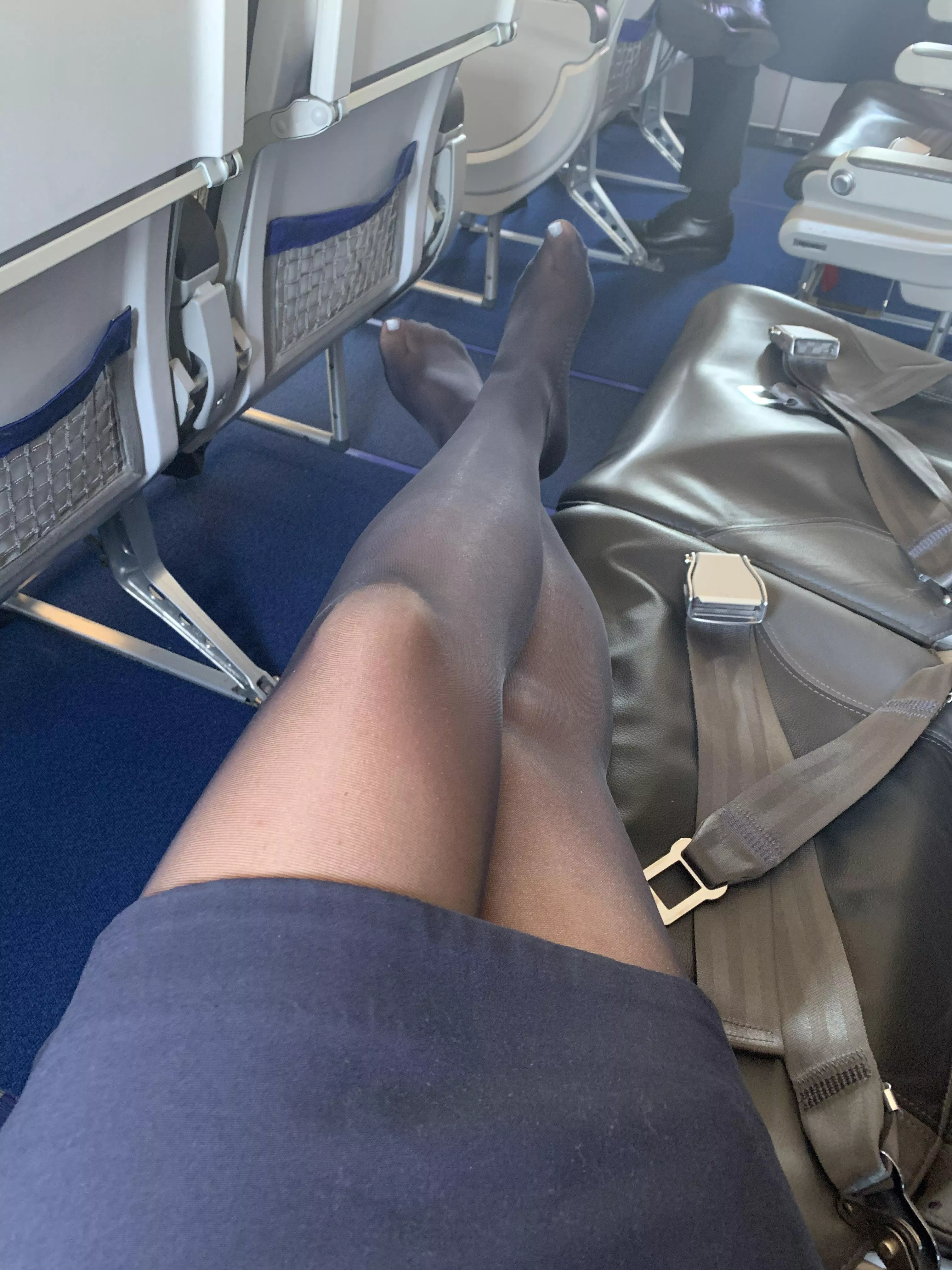 Flight attendant feet resting from wearing heels all day