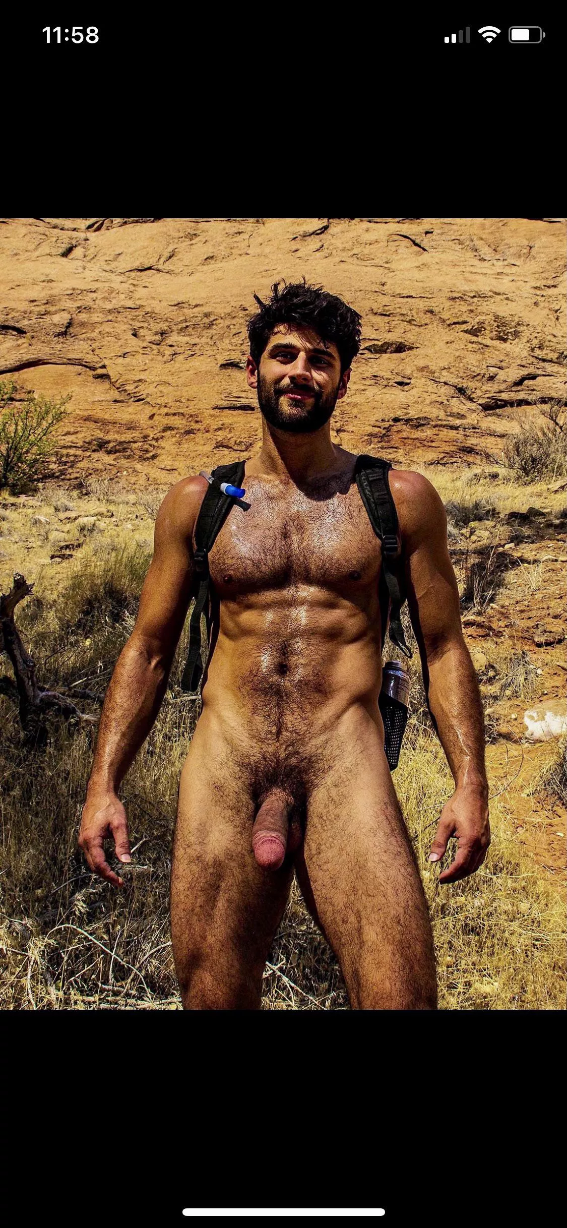 Found this picture a while back. Who is this guy? He is sexy as fuck!