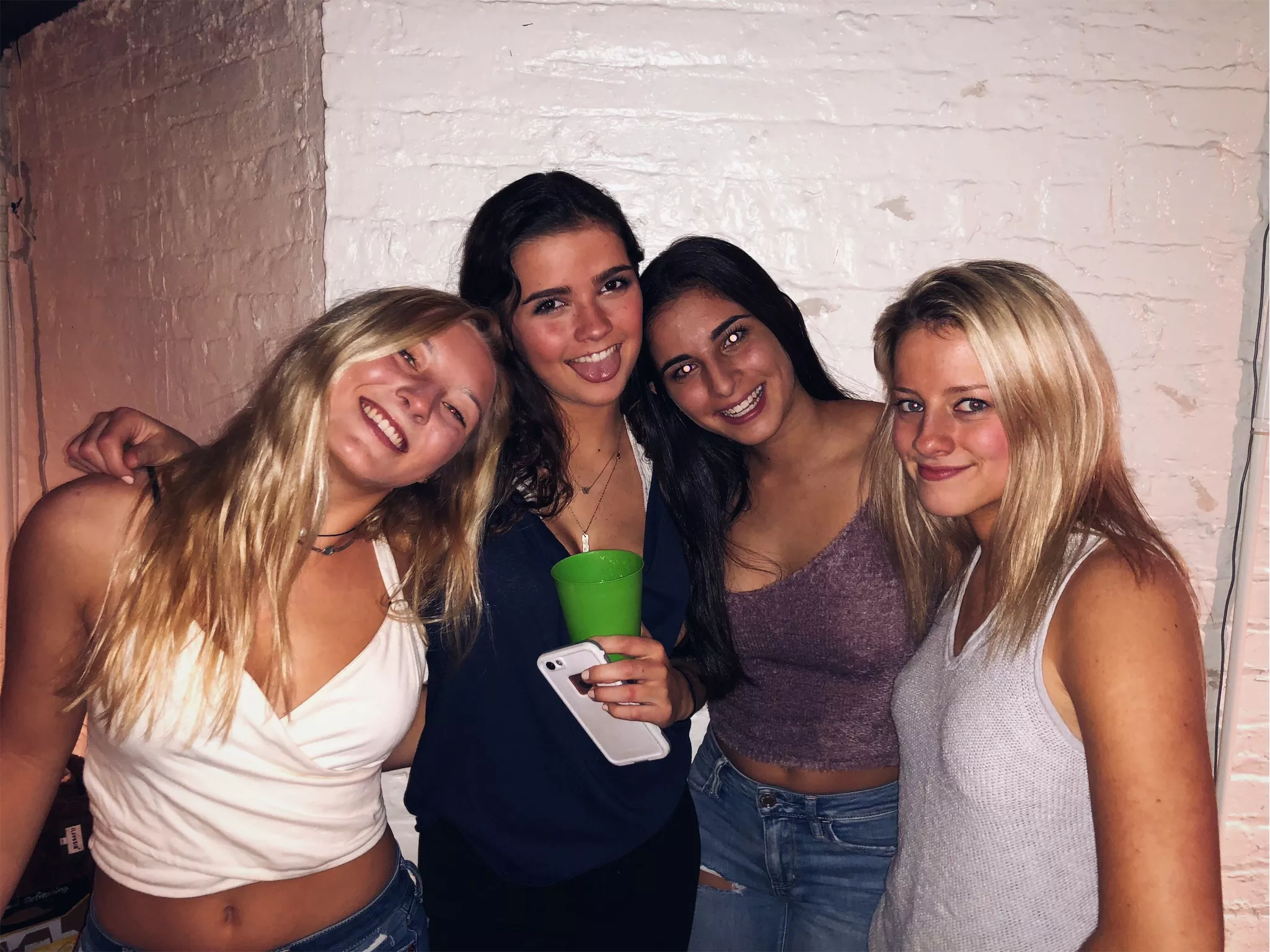 Four friends at a party