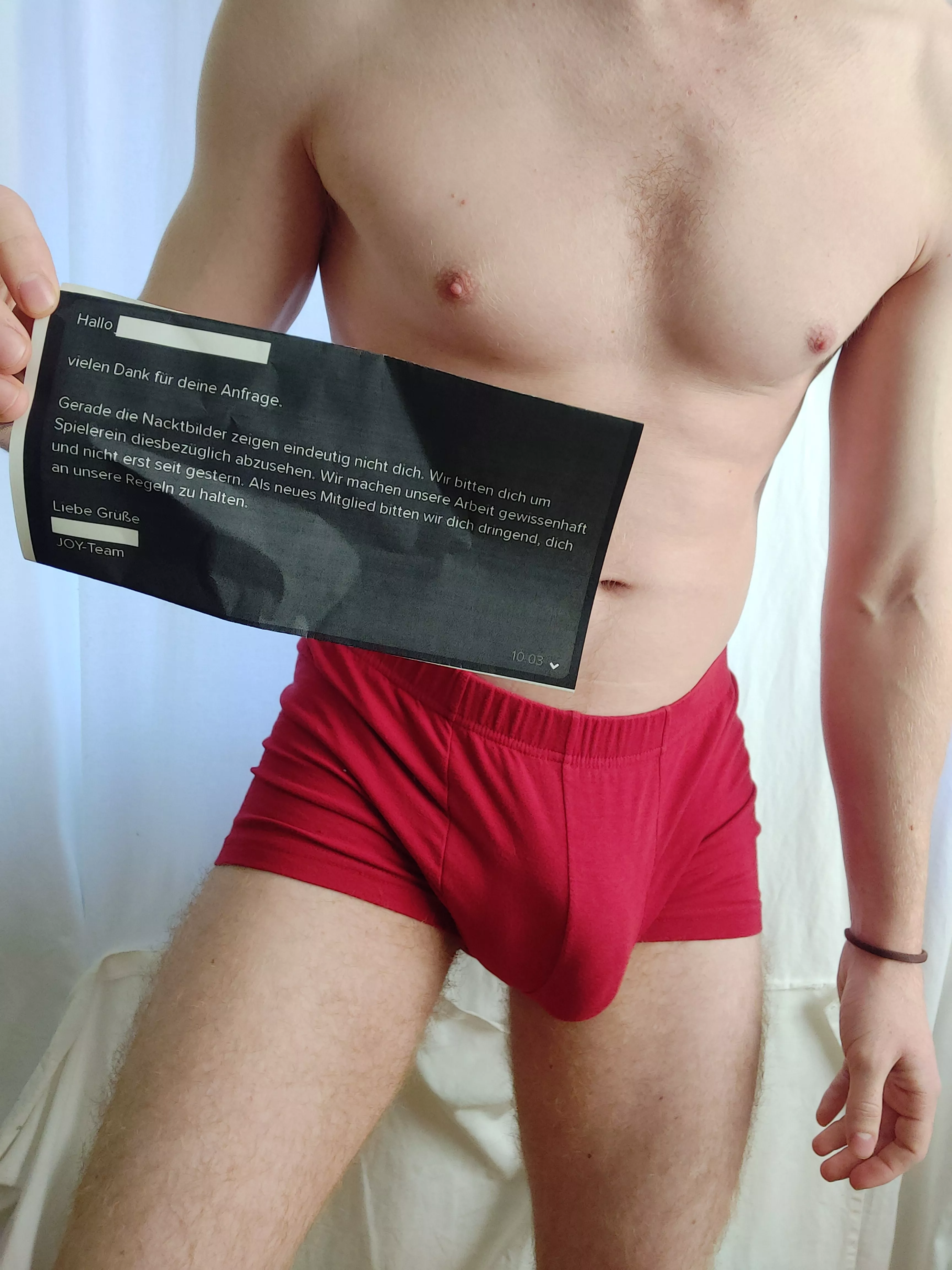 German dating site's admins didn't believe the pics I uploaded were mine. I sent them this photo of me holding their message as proof. Never got an answer 🤷‍♂