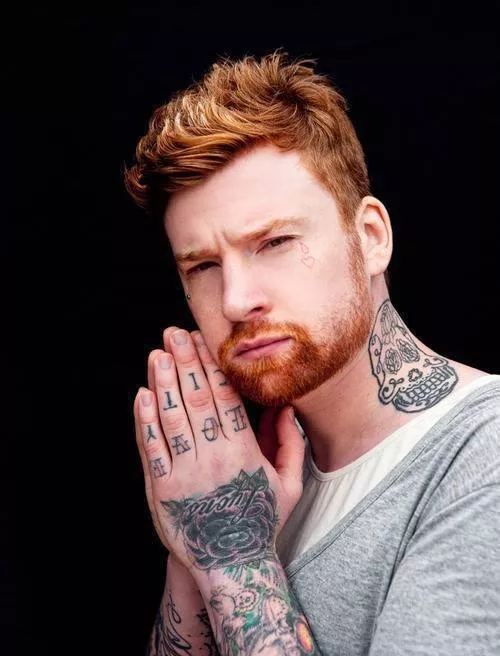 Ginger with some tattoos