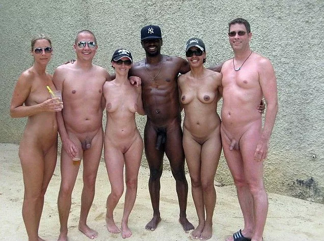 Group of nudist friends posing for the photo