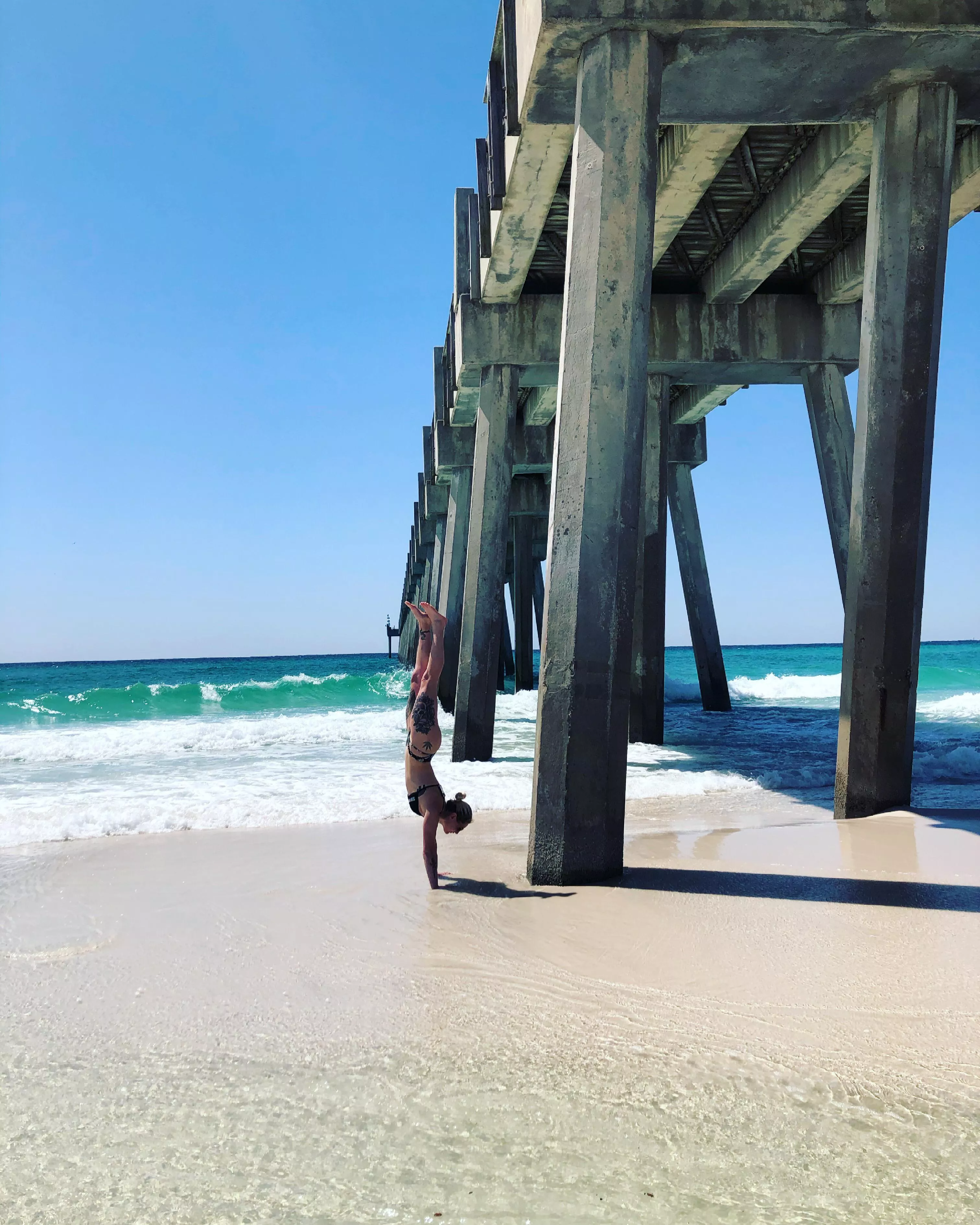 Hand stands on the beach 🙃