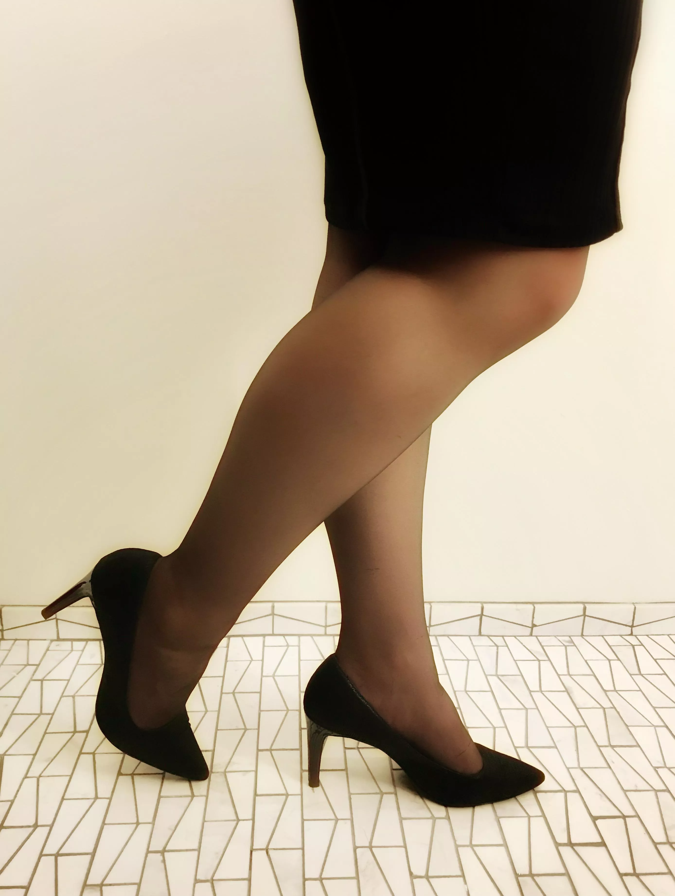 Hard enough to stay focused at work with the clack of heels; even more so when she has nylons onâ€¦