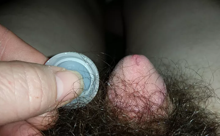 Here is a pic I took a while ago with me comparing my halfway hard penis to a water bottle cap..