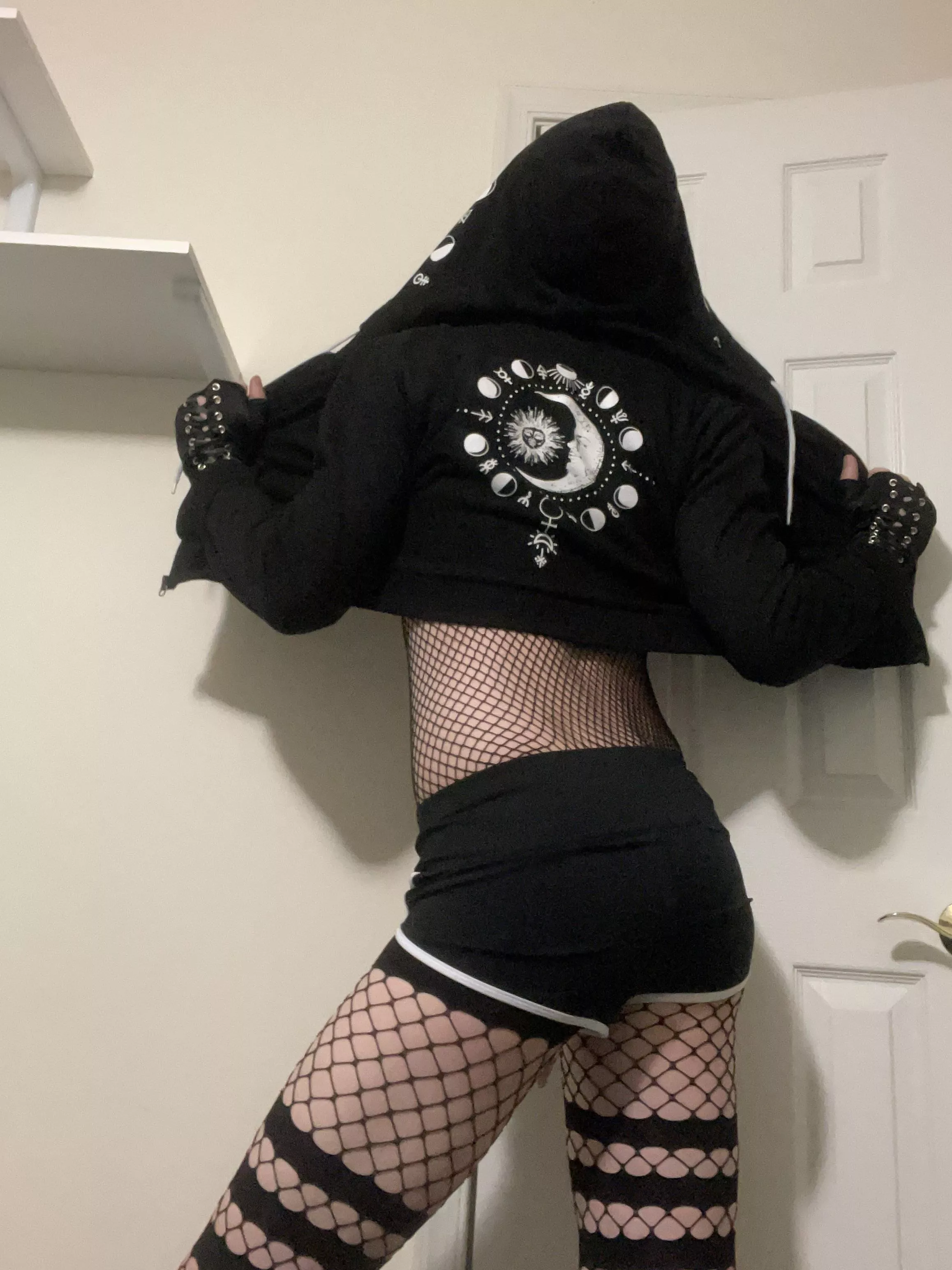 Here’s the back of my hoodie. And my friends said I should bartend at a club in my fit lol