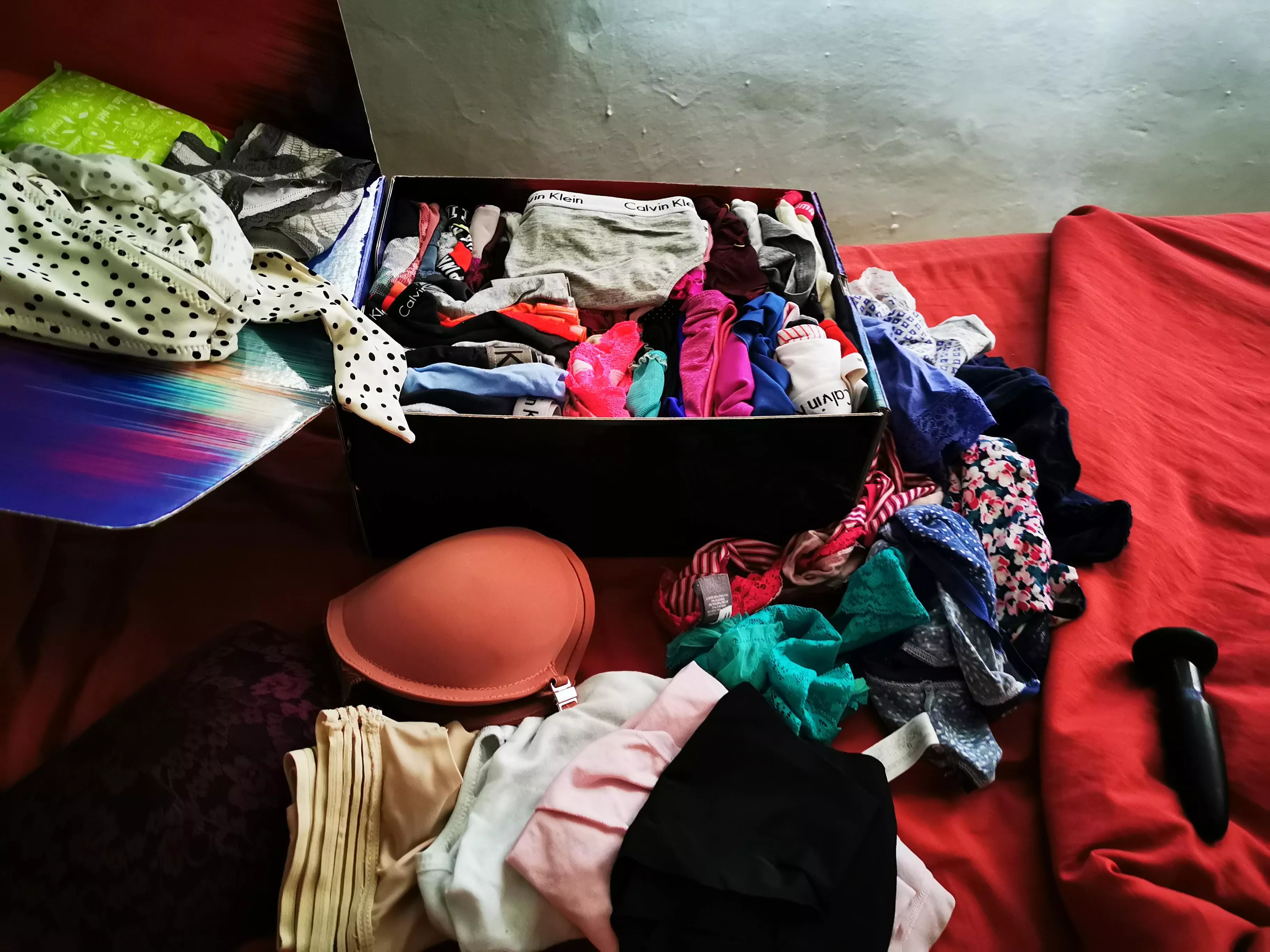 Home alone, the ones in the box are my collection, also the bras and the panties below, the one bext the box are my wife s dirty panties of the week.