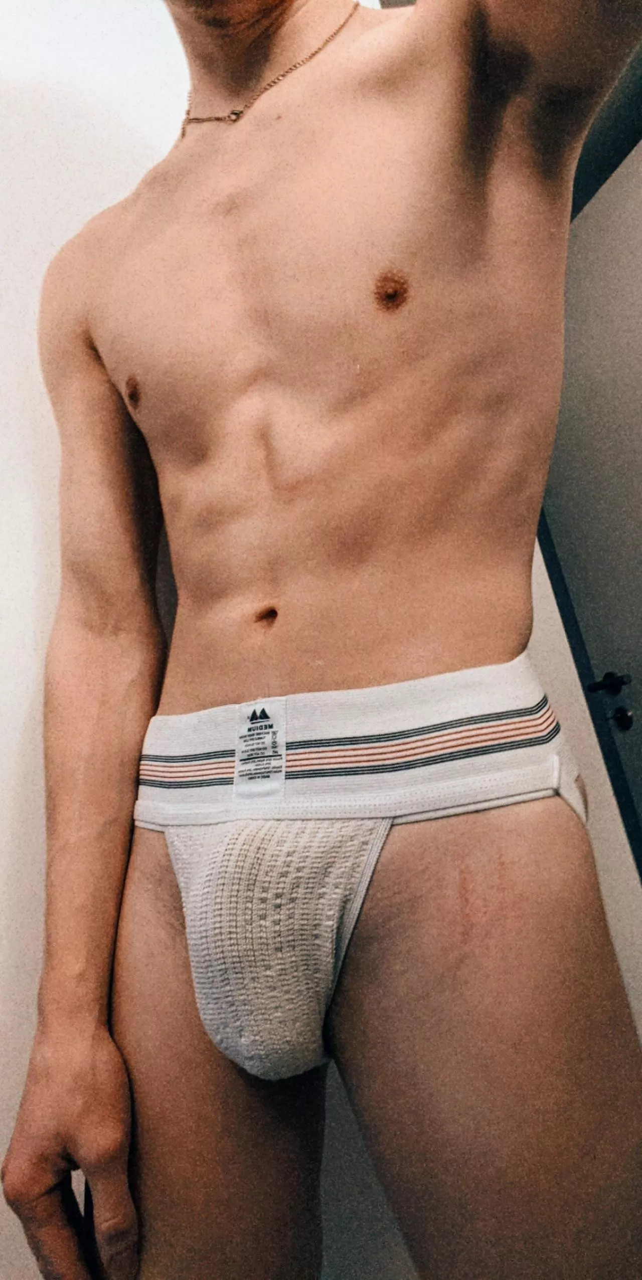 Hot athletic Twink with some ABS in a Jockstrap