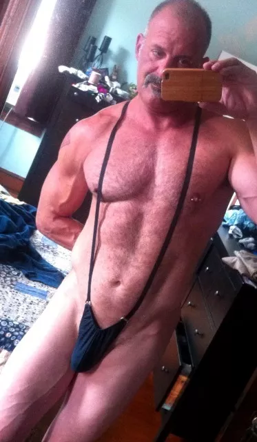 Hot daddy in a slingkini