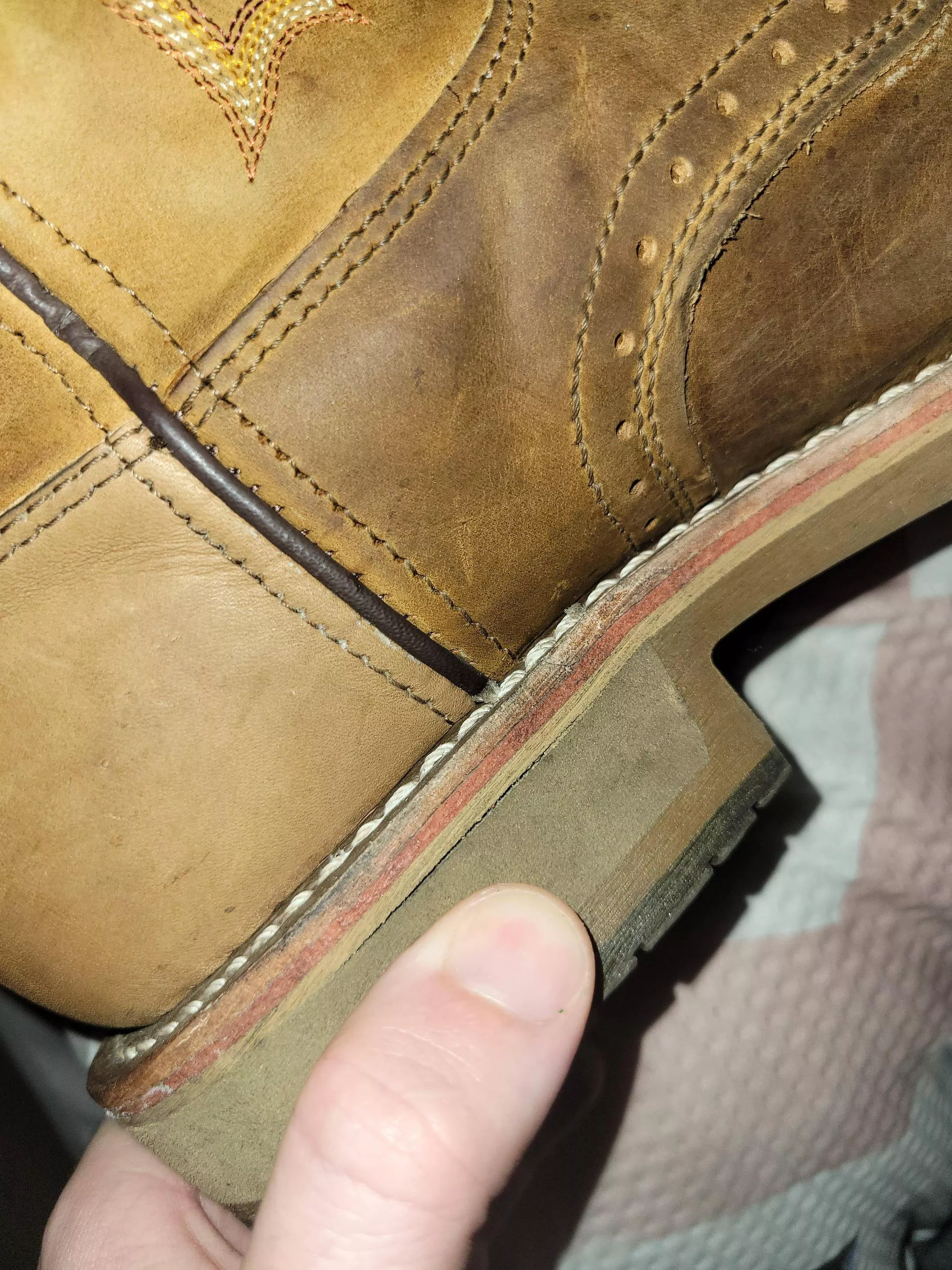 Is this little split on the heel of my fucking boots a big deal? Paid big money for these.