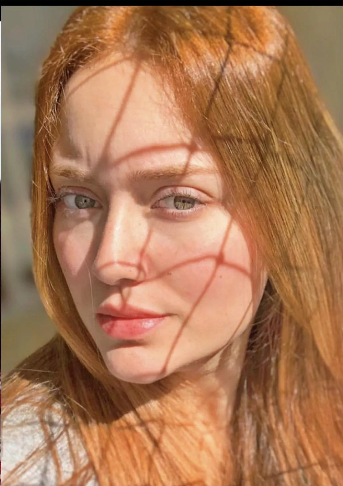 It’s a face closed up ok? Brazilian, redhead and green eyes. Any comment?