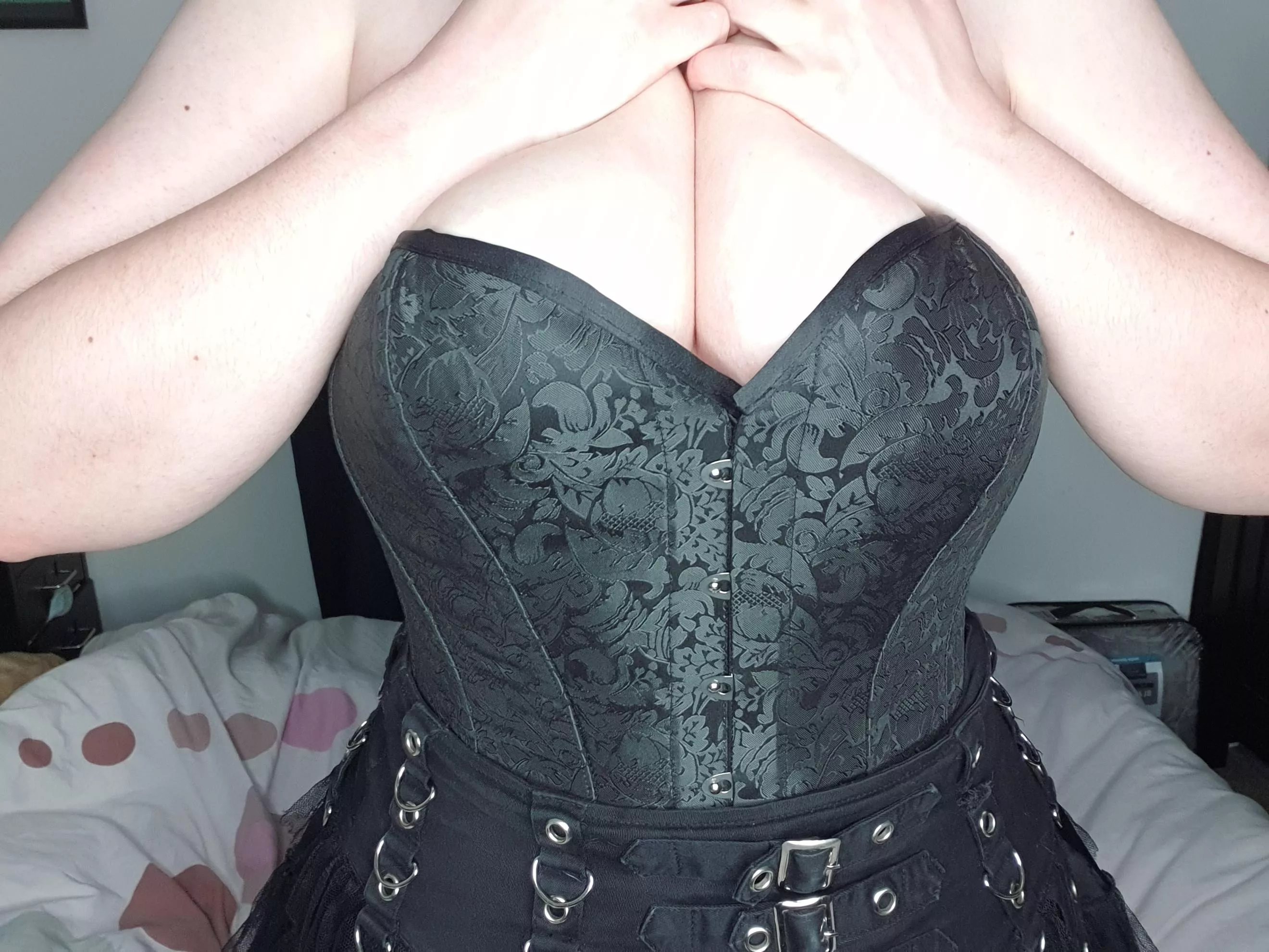 Just a corset and a short skirt no panties, perfect outfit right?