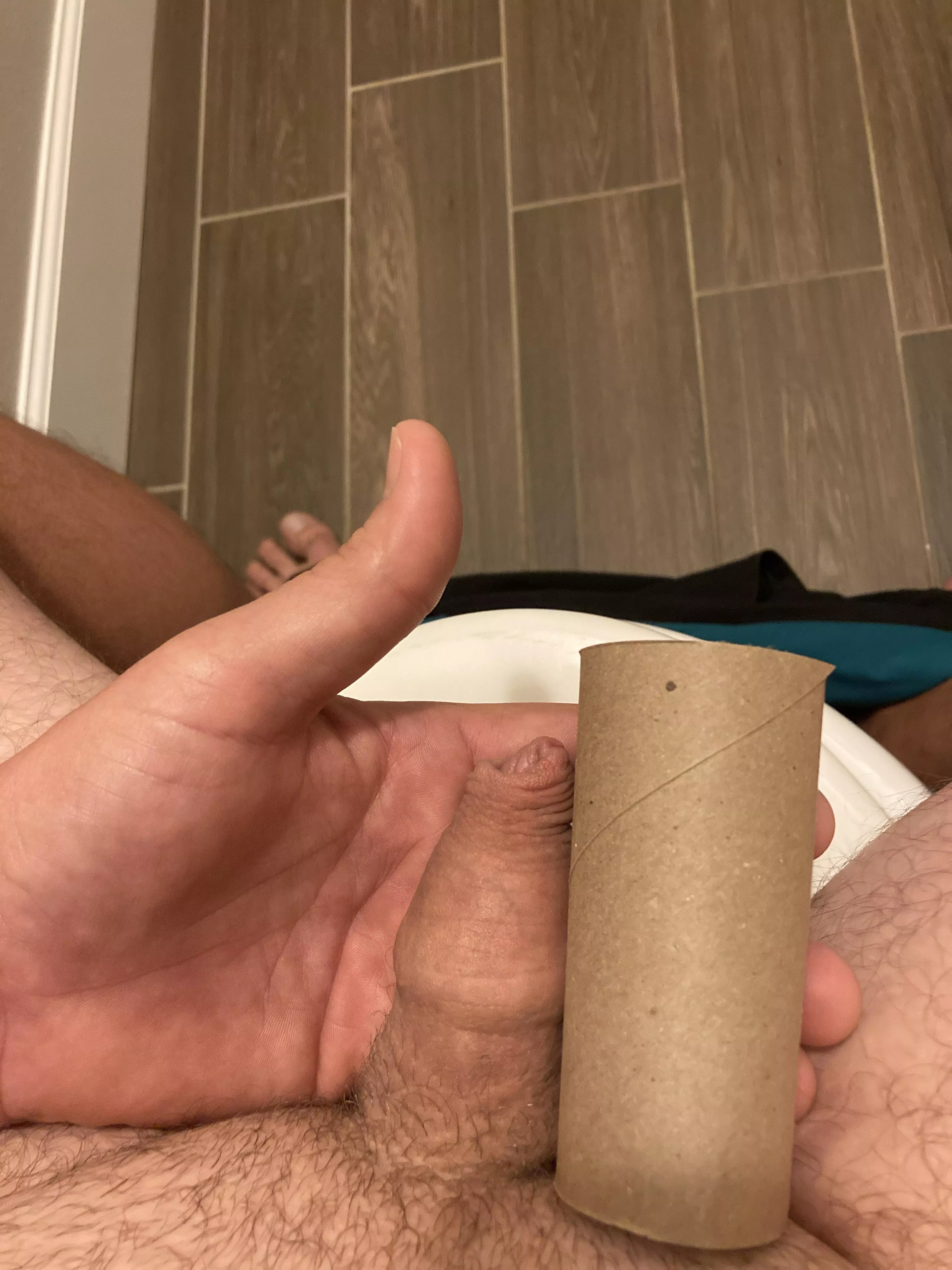 Just a normal flaccid guy with a toilet roll!