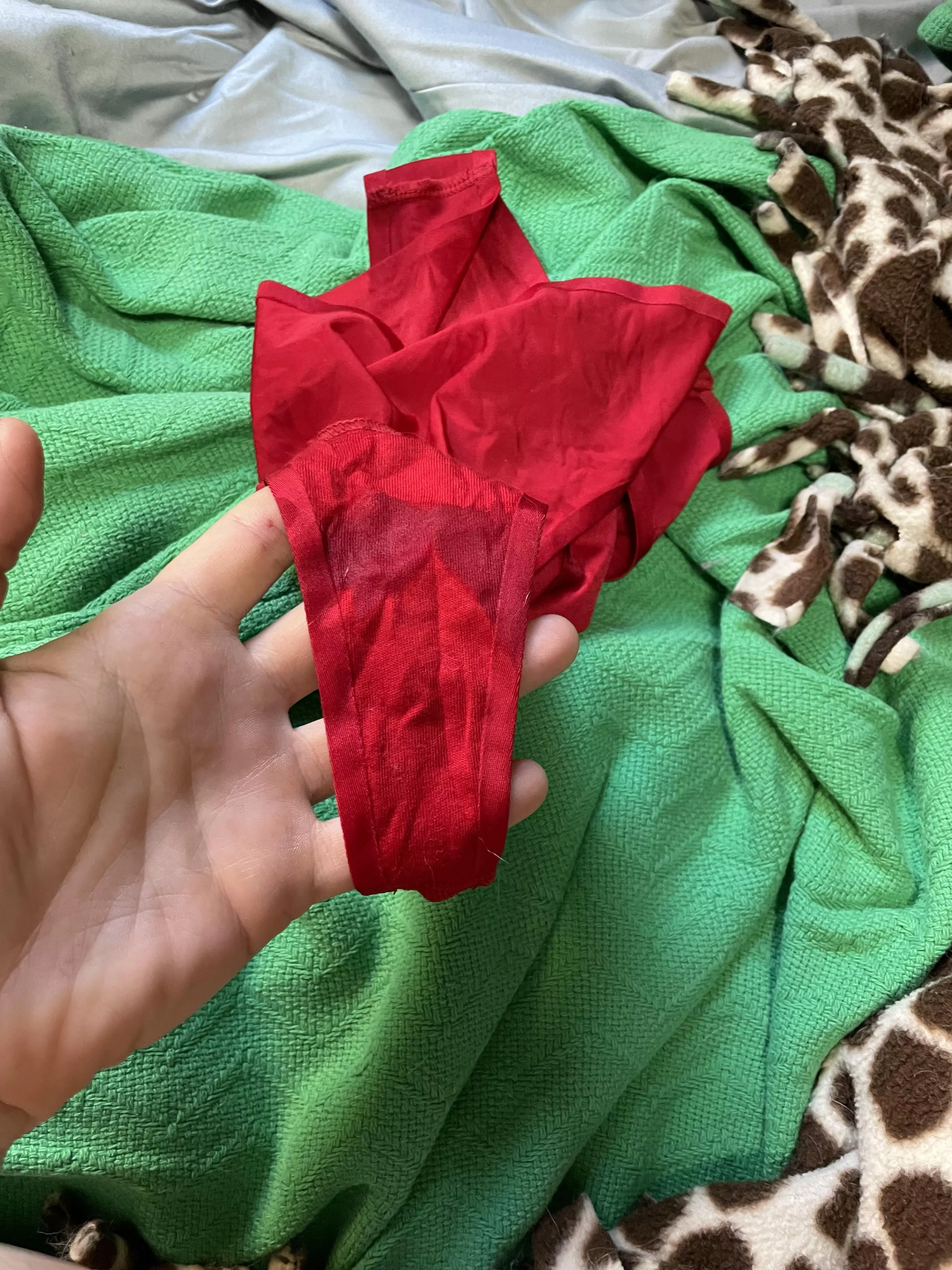 Just started this red satin thongâ€¦ Let me know what I should do to it ðŸ˜˜