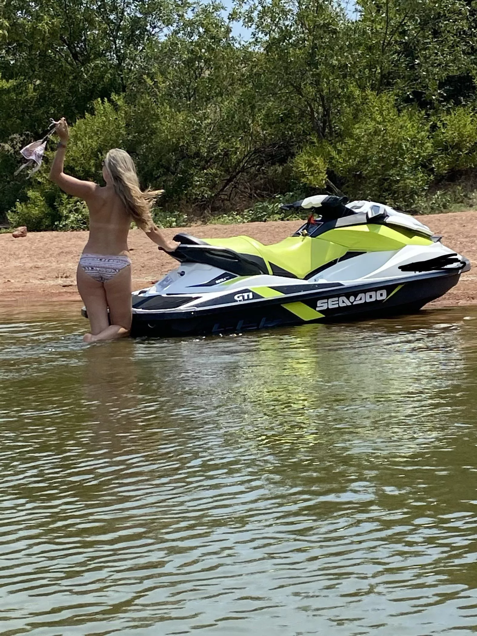 Lake life is always better when youâ€™re topless ðŸ˜‰