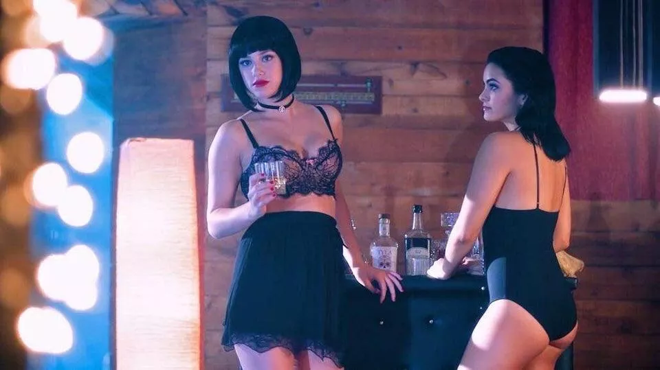 Lili Reinhart and Camilla Mendes looking at you tied to the bed