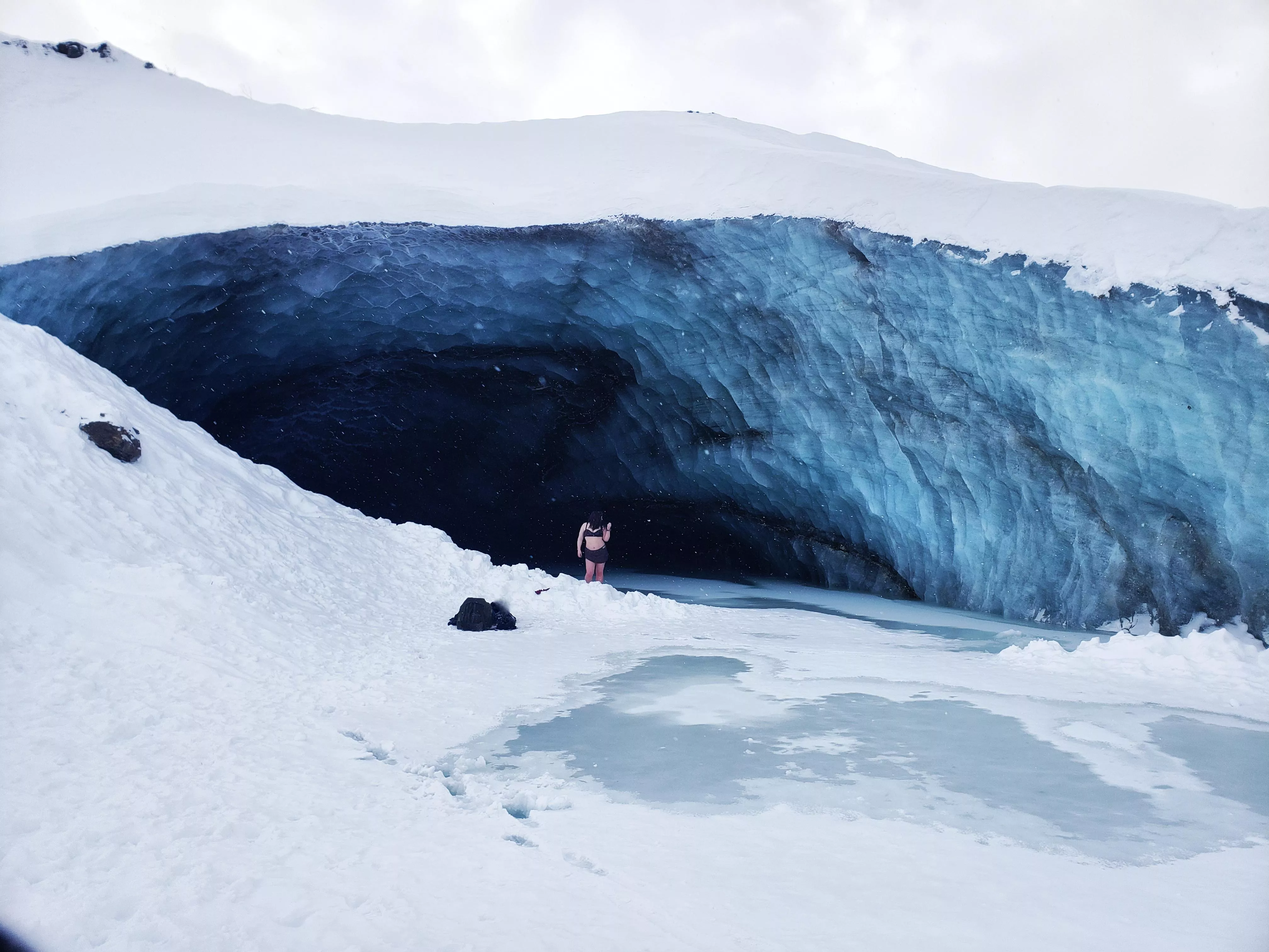 Little woman in a great big ice cave...