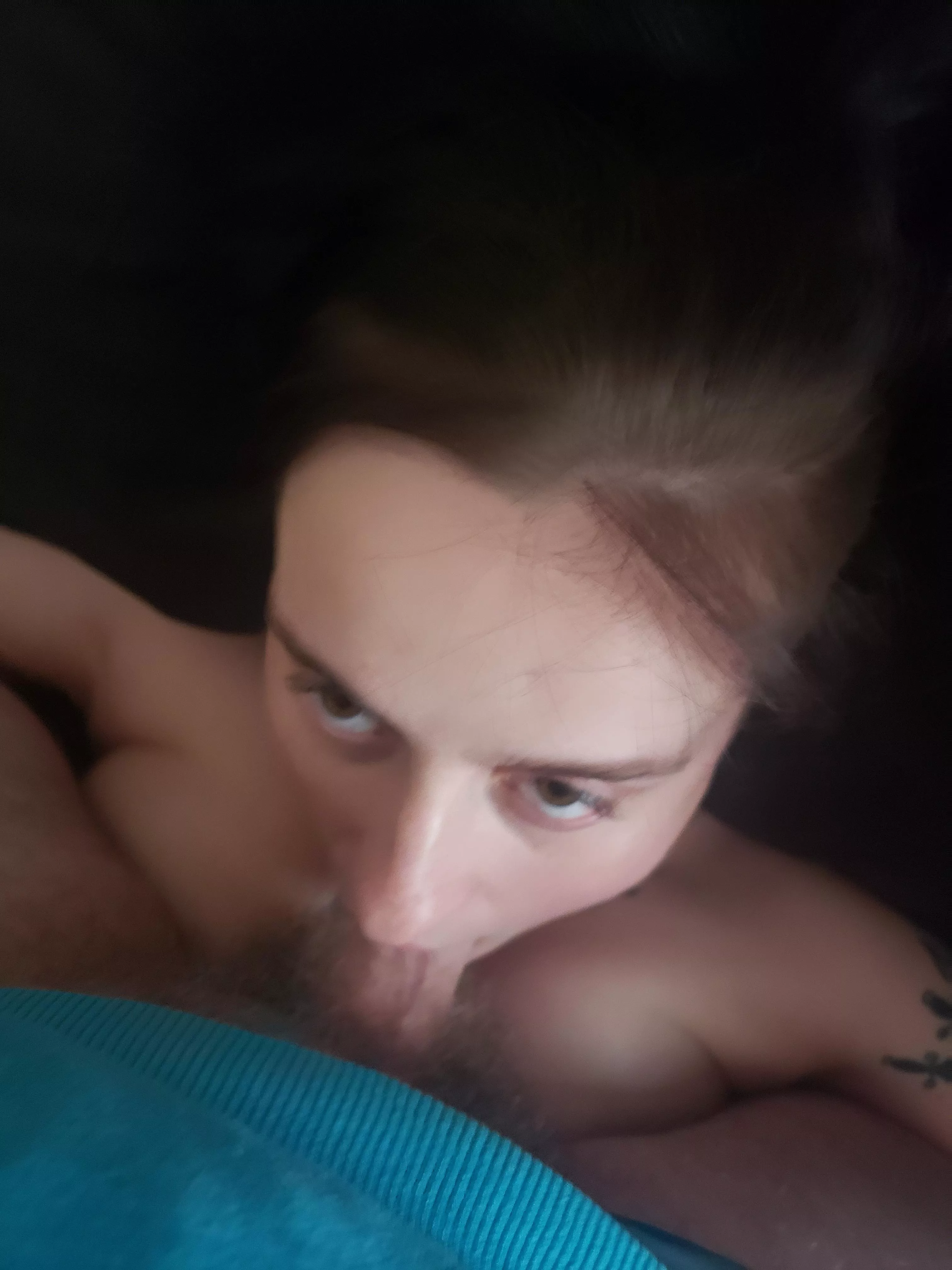 Looking me in the eyes while I gag her with my cock