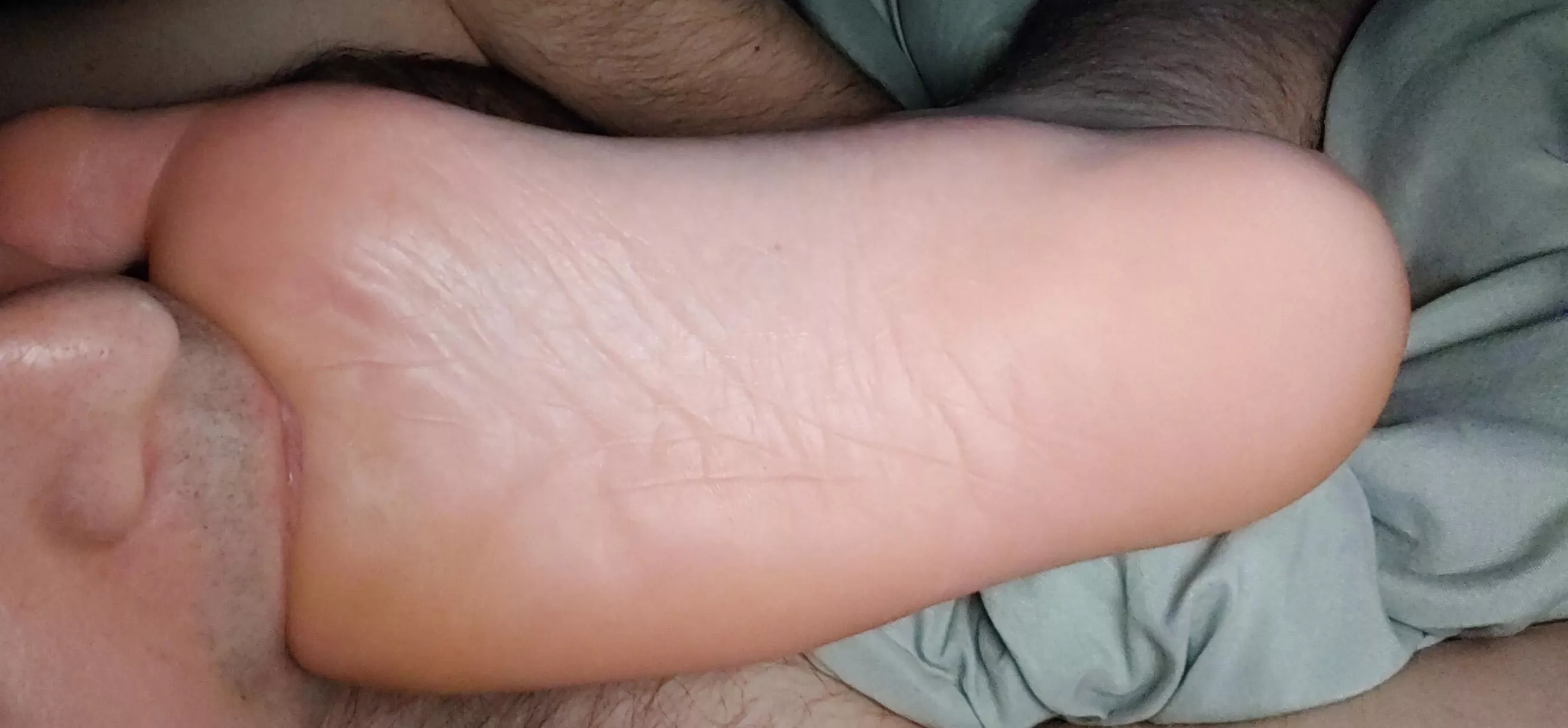 Me sucking on my man's size 13 foot. They taste amazing when they get sweaty!