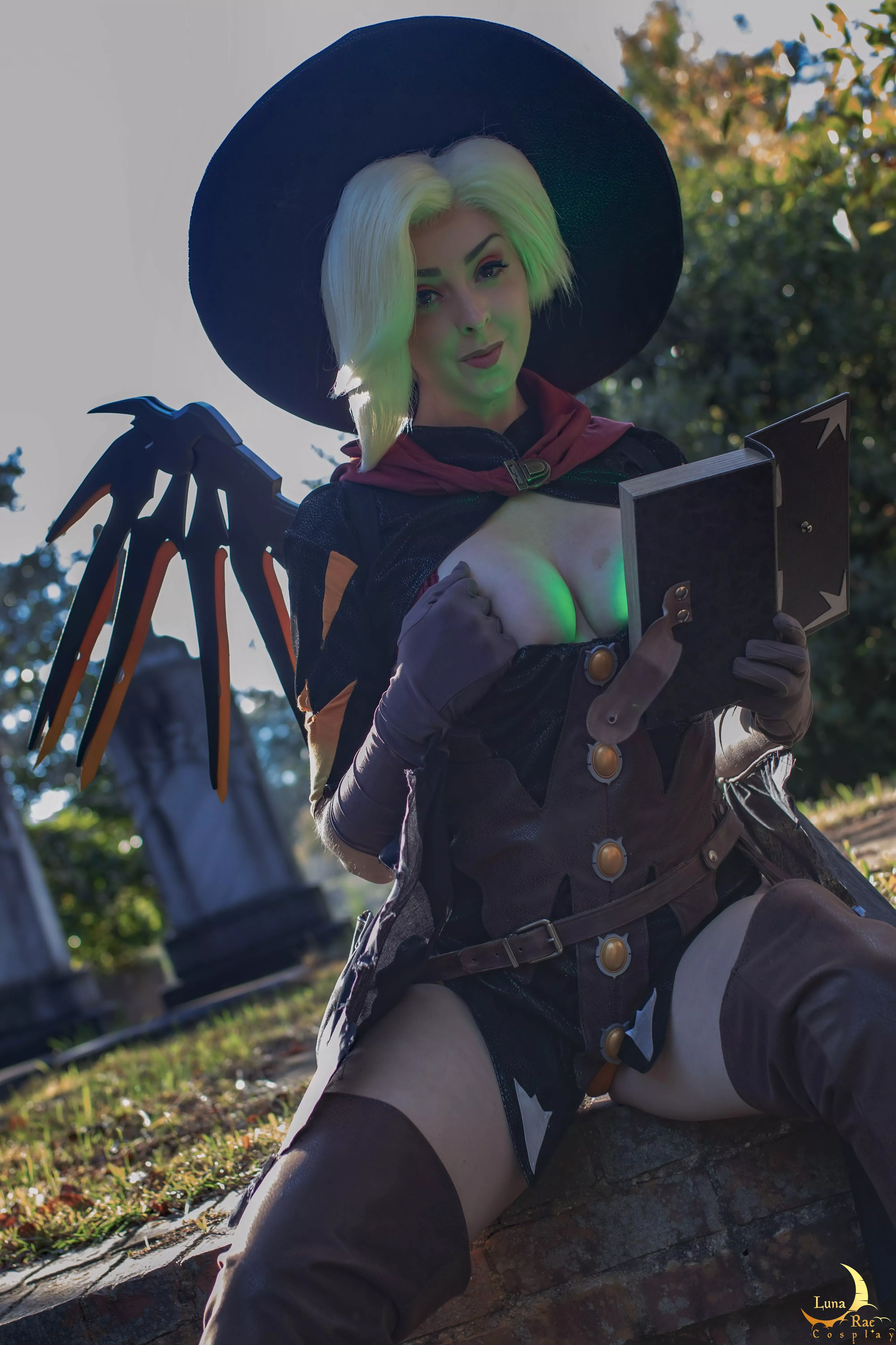 Mercy offering a little peek during match intermission. Witch Mercy cosplay by LunaRaeCosplay