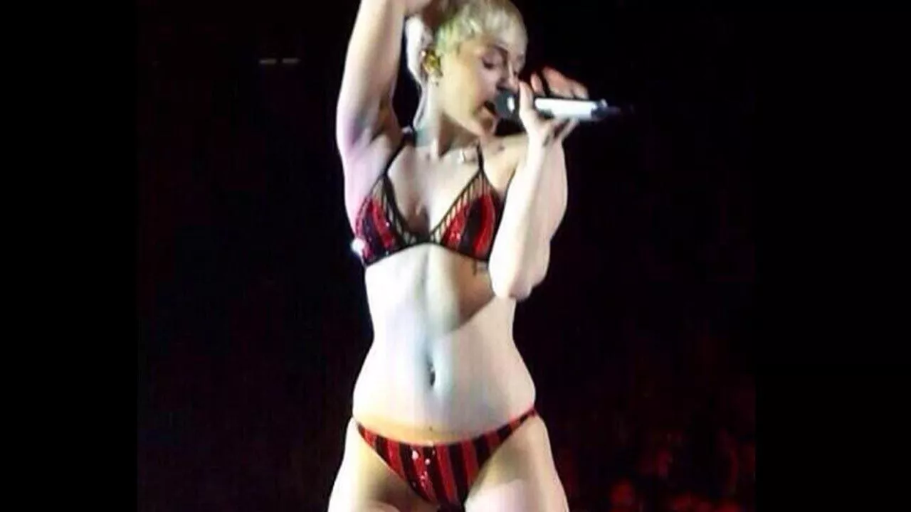 Miley Cyrus gets me going bad,Take a seat on my laps and feel this thick girth start rub up against you