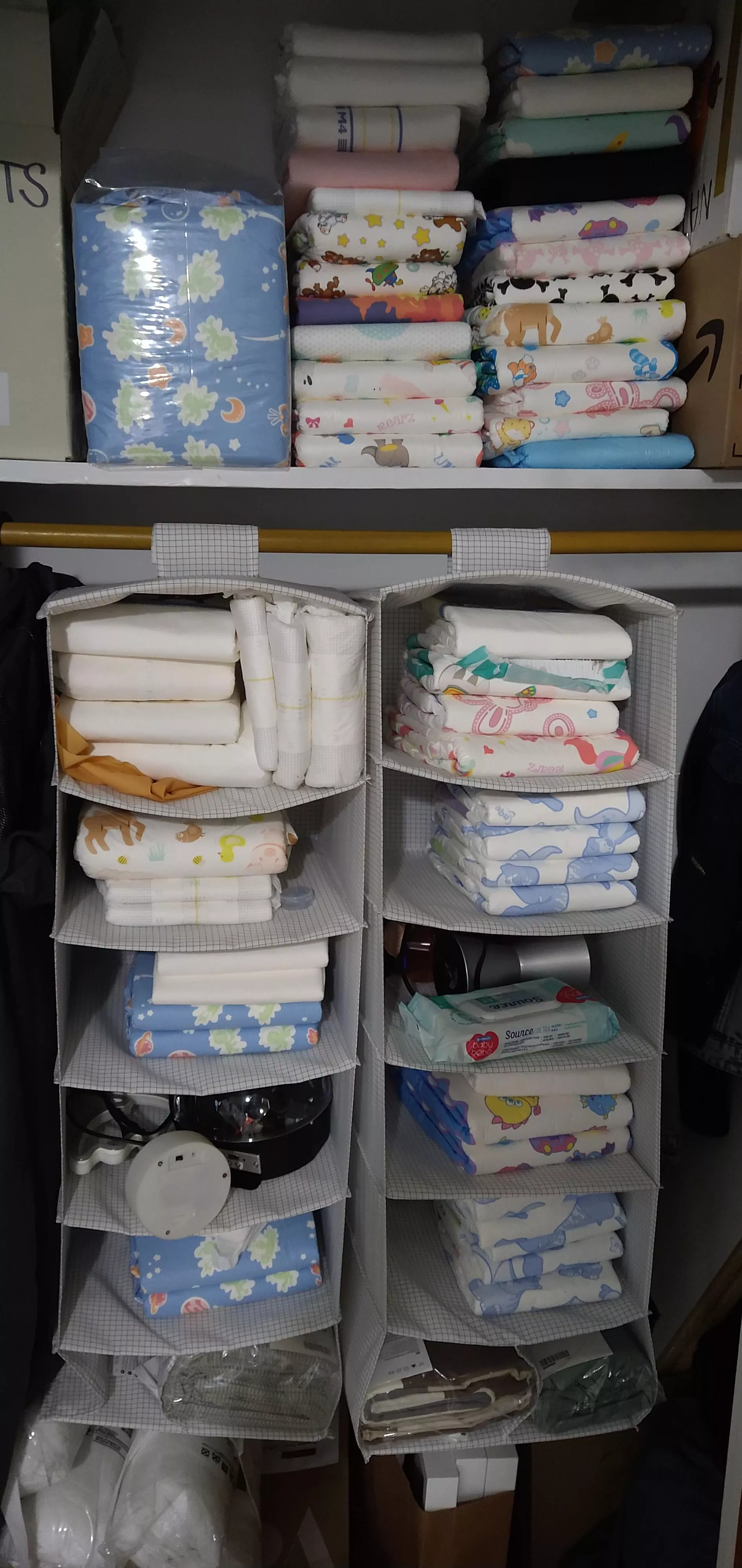 Moved in with GF, got my first open stash! (The ones at the top are a collection of one of all the diapers I've had)