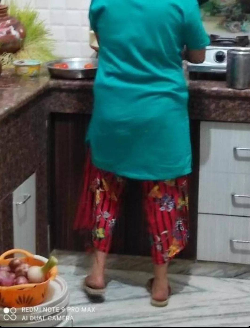 My mom is working like this in kitchen I want someone come and hold her from back press her ass, boobs fuck her in kitchen 🤤🤤